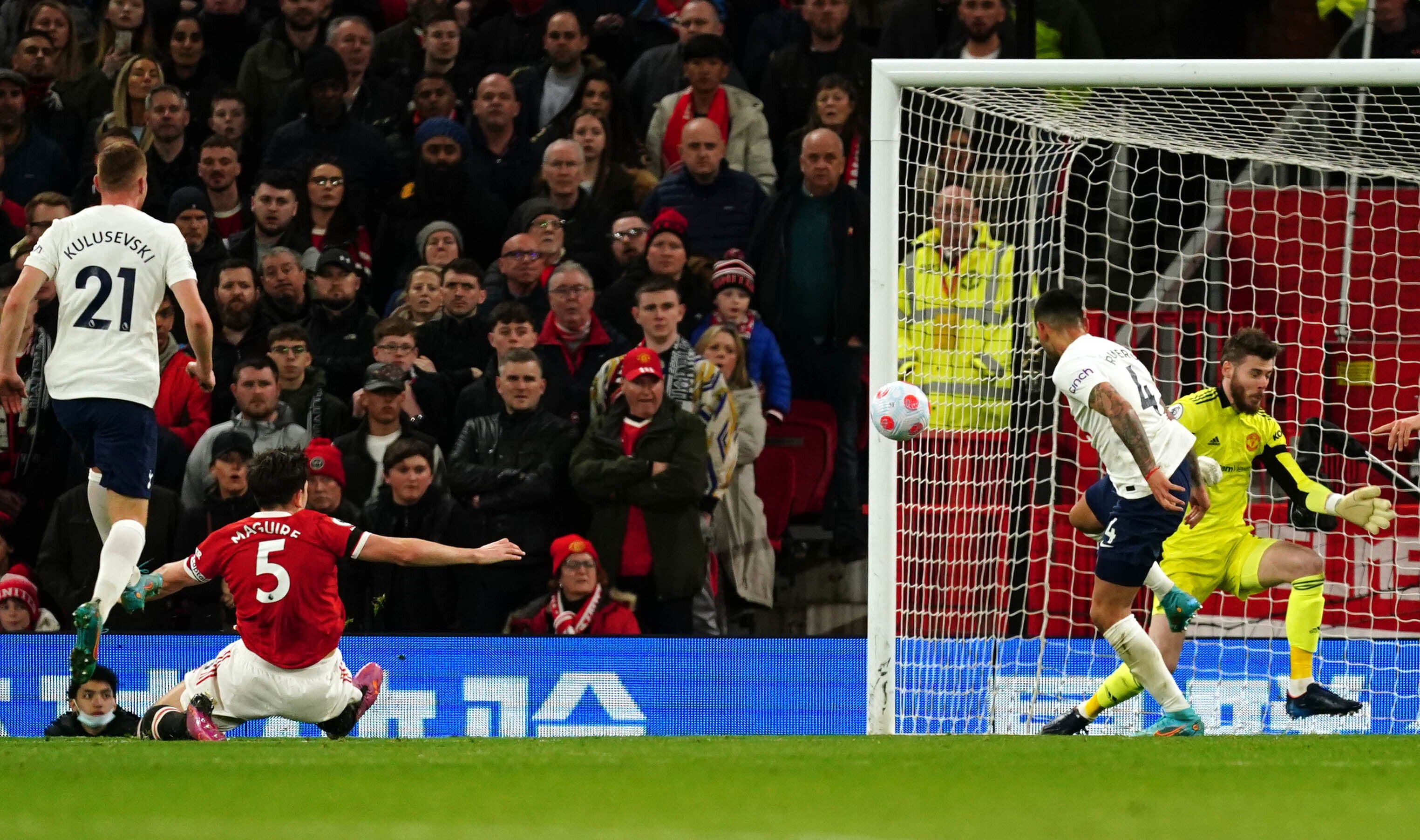 Manchester United captain Harry Maguire, second left, scores an own goal to level the scores against Tottenham (Martin Rickett/PA)