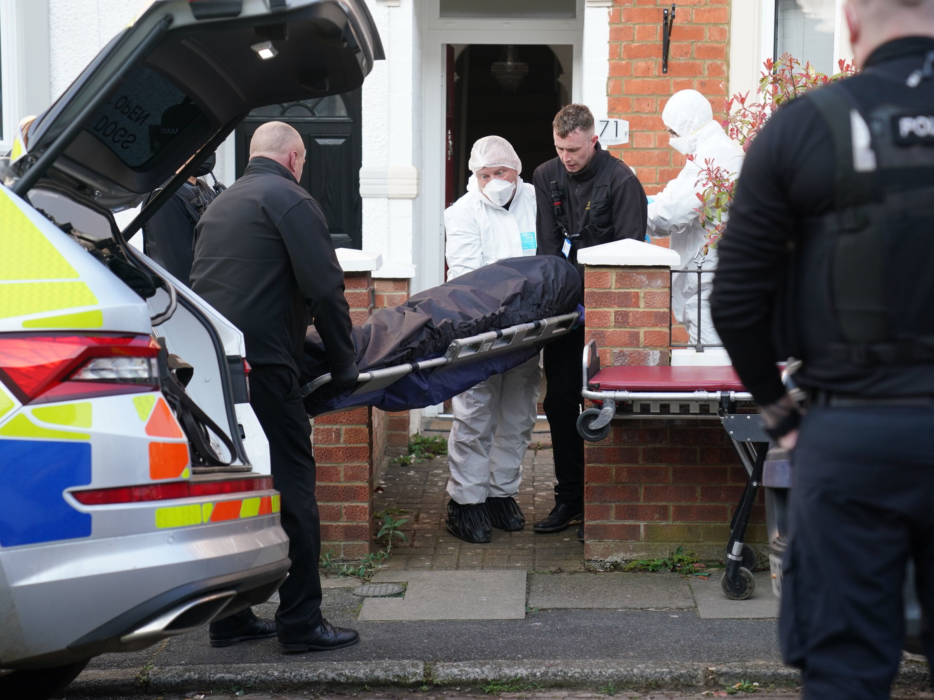 The body of missing man Nicholas Billingham is removed from a property in Moore Street, Kingsley, Northampton, following its discovery in the rear garden four months after he went missing