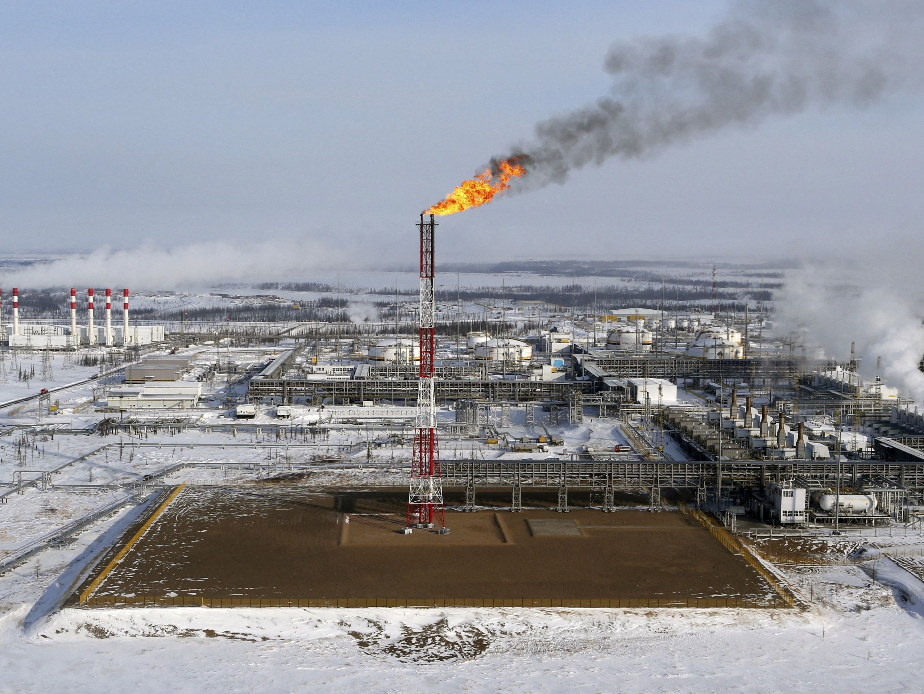 A flame burns from a tower at the Vankorskoye oilfield owned by Russia’s Rosneft energy company