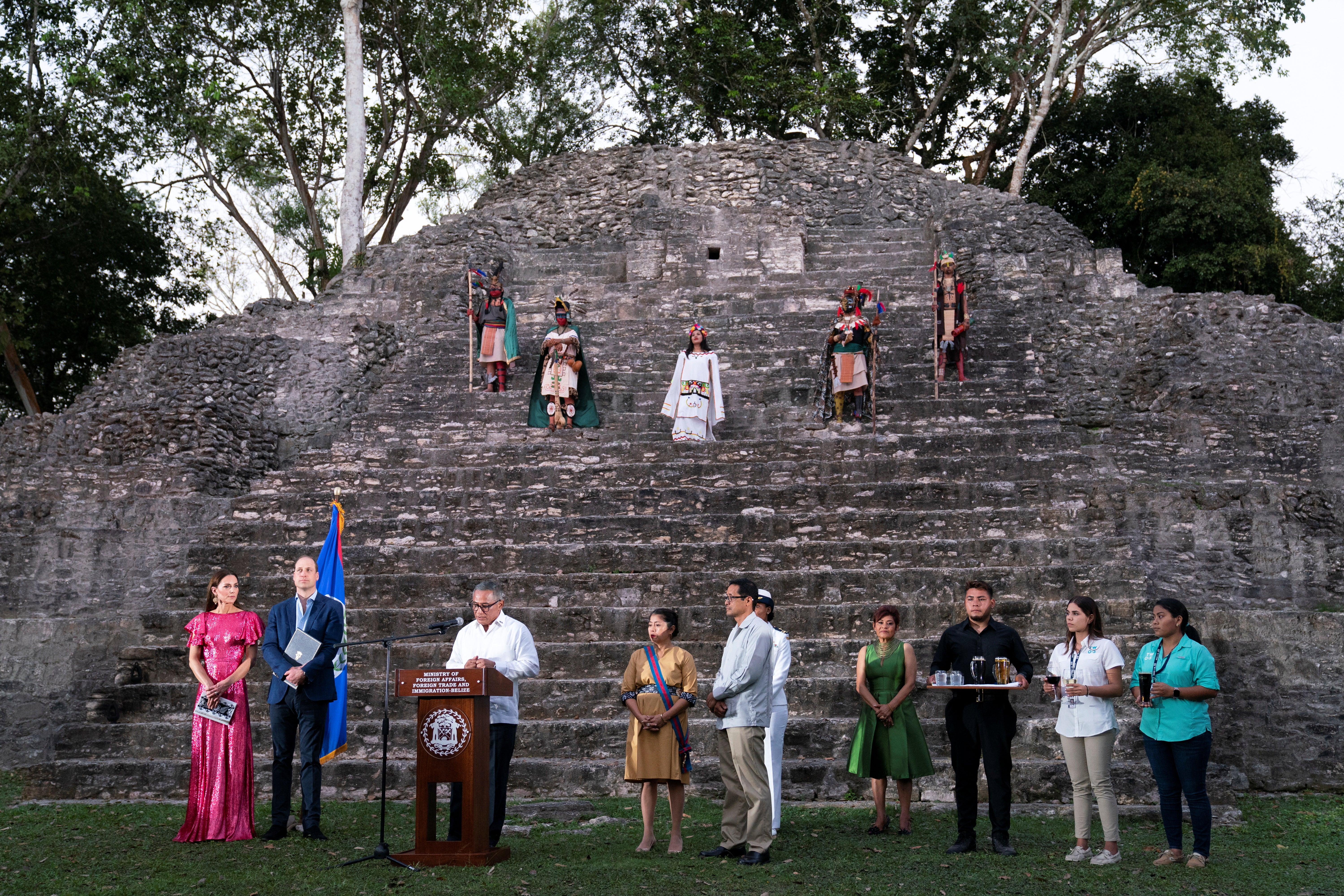 Prince William and Catherine, Duchess of Cambridge listen as Belize's Prime Minister Johnny Briceno delivers a speech, during a special reception in celebration of the Queen's Platinum Jubilee, hosted by the Governor General of Belize Froyla Tzalam, on the third day of their tour of the Caribbean, at the Mayan ruins at Cahal Pech, Belize