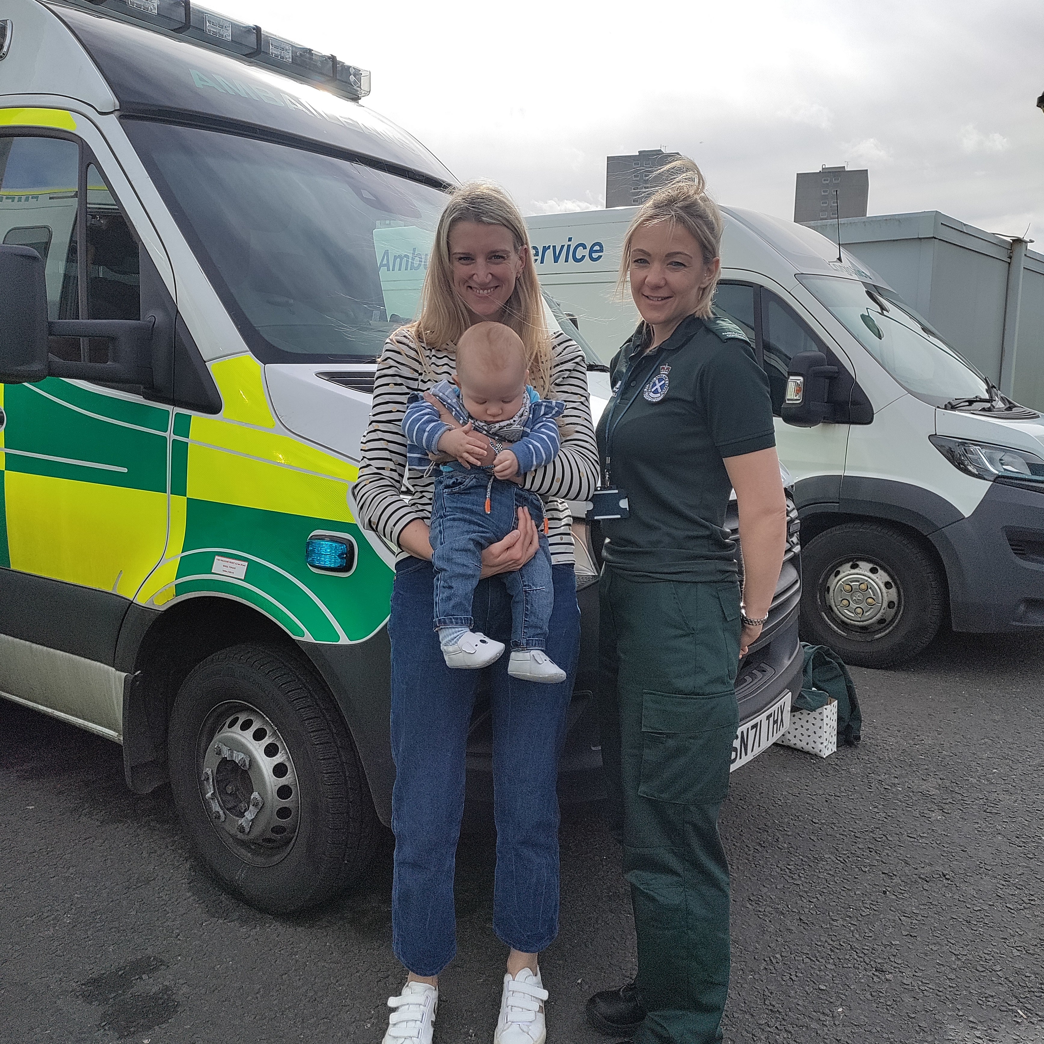 Alex Clayton and son Fraser with ambulance call handler Lorna Milward (Scottish Ambulance Service/PA)