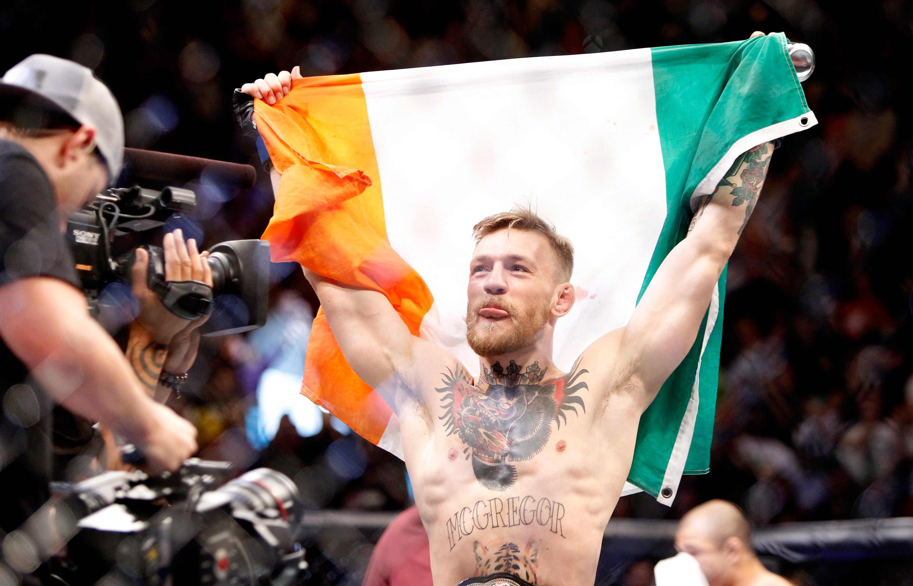 McGregor celebrates winning the UFC featherweight title from Jose Aldo