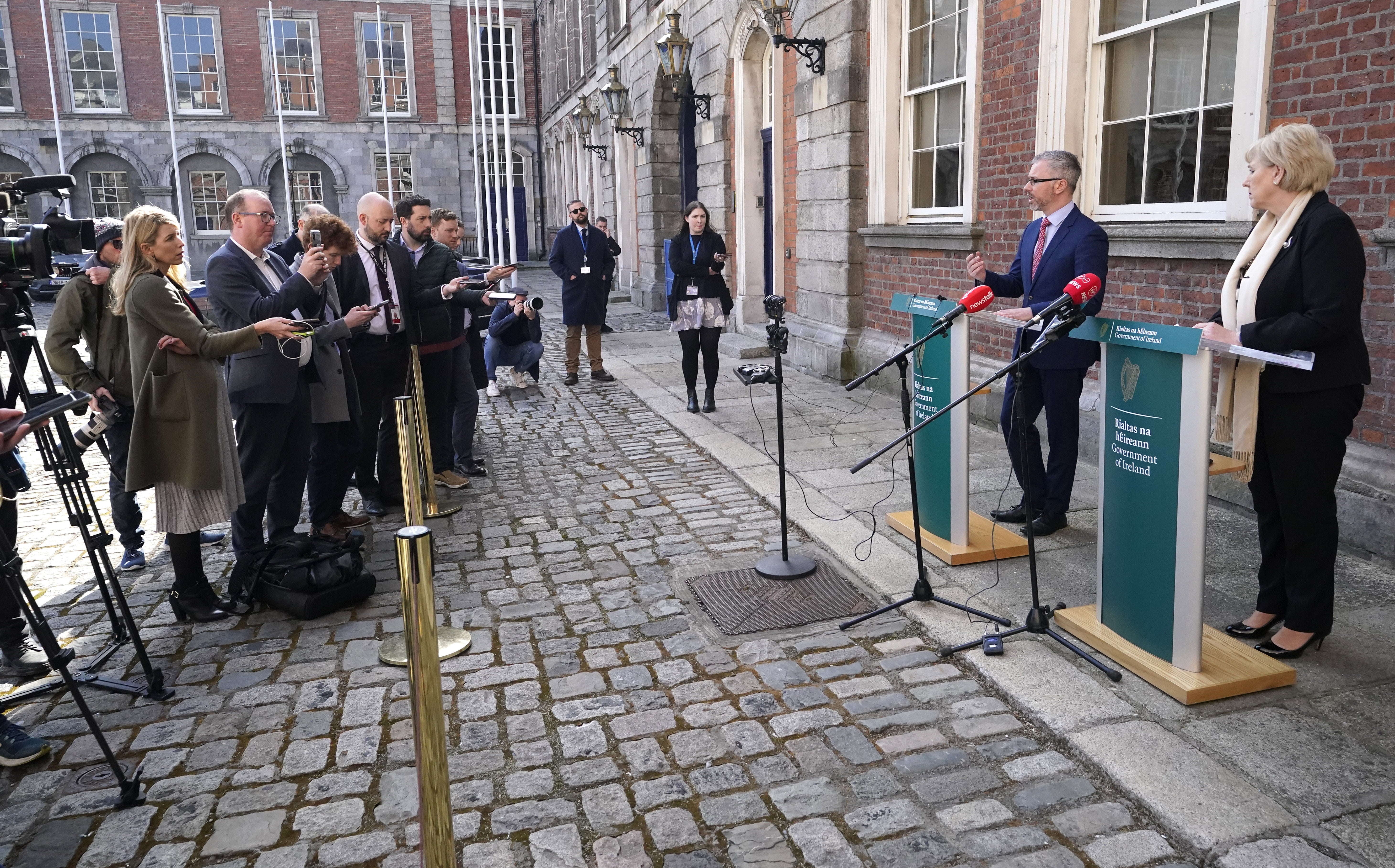 Roderic O’Gorman and Heather Humphreys speak to the media outside Dublin Castle following a cabinet meeting (Niall Carson/PA)