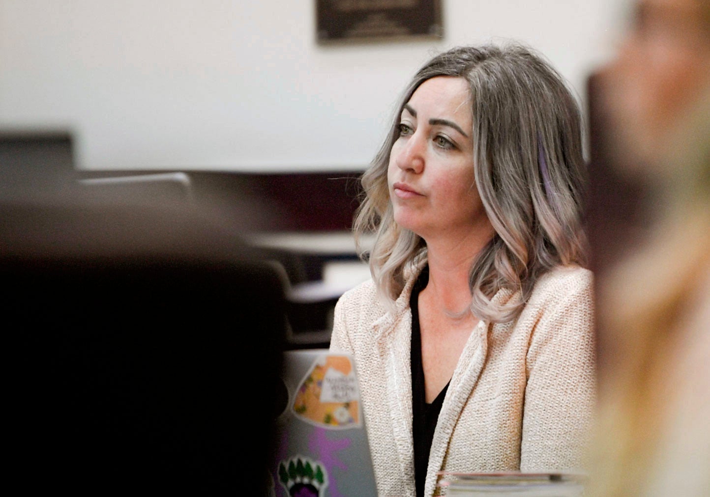 RaDonda Vaught, a former Vanderbilt University Medical Center nurse charged with in the death of a patient, listens to the opening statements during her trial at Justice A.A. Birch Building in Nashville, Tenn., Tuesday, 22 March 2022.