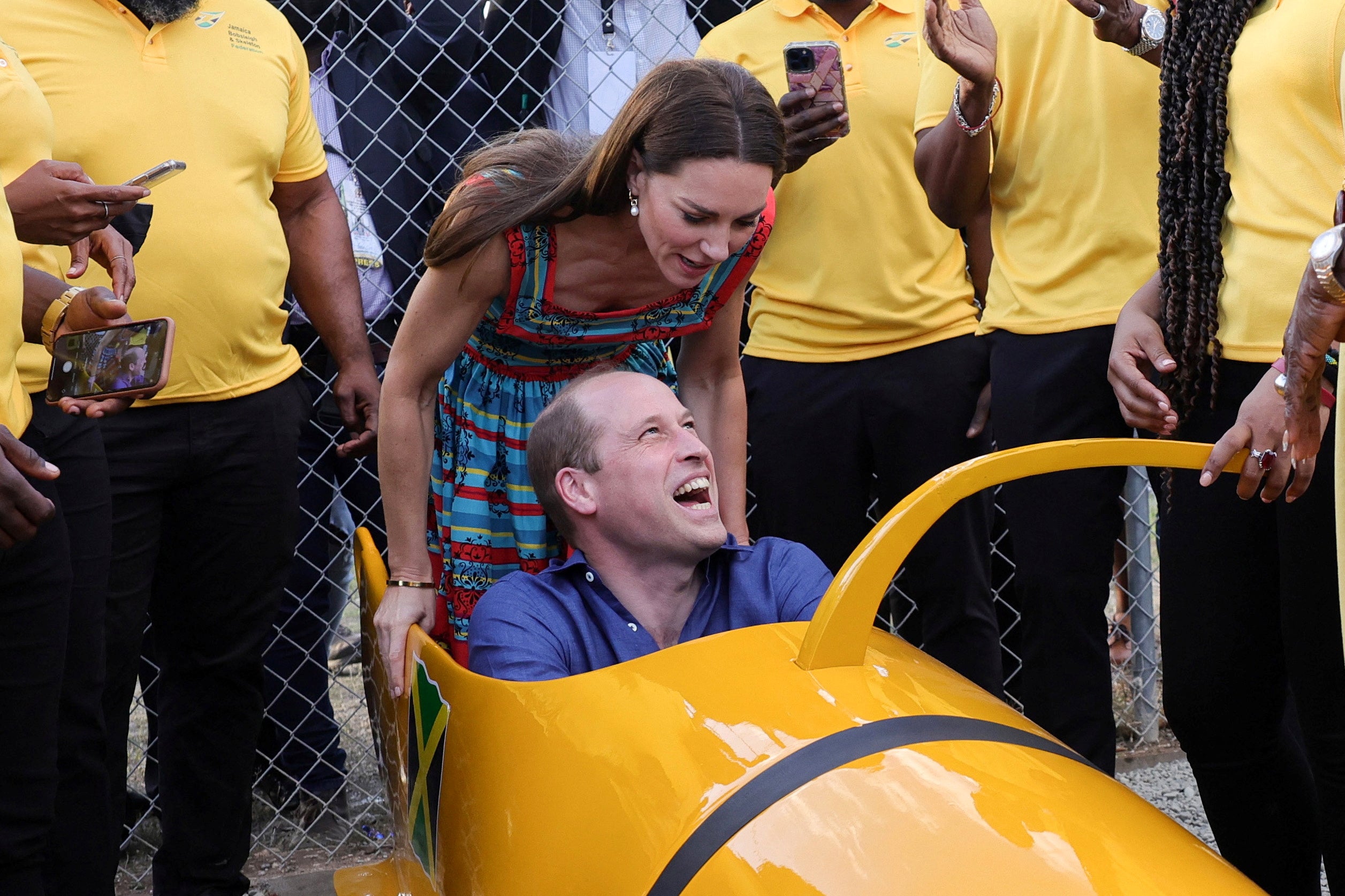 Prince William, Duke of Cambridge and Catherine, Duchess of Cambridge meet The Jamaica National bobsleigh team during a visit to Trench Town, the birthplace of reggae music