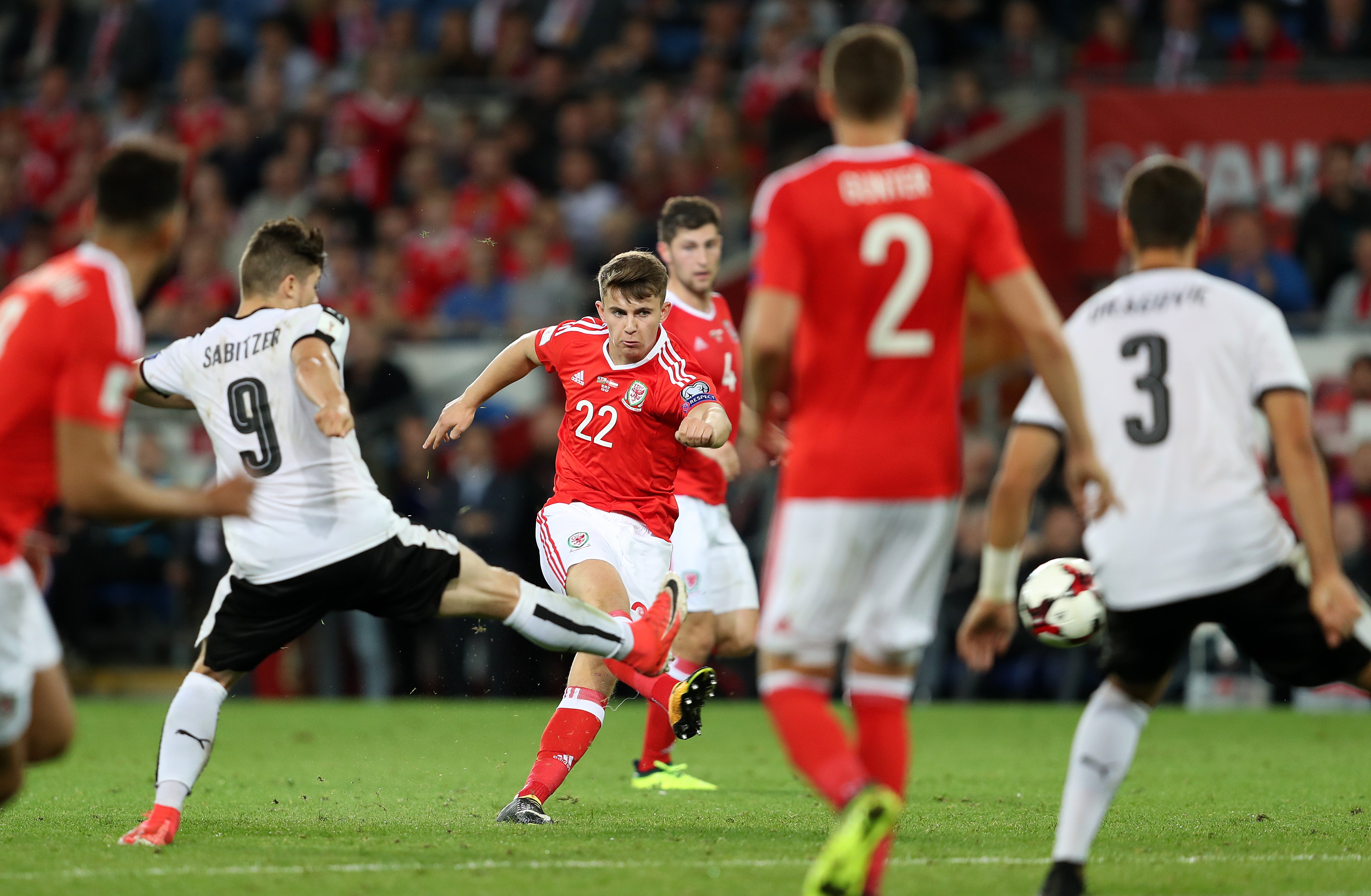 Ben Woodburn (centre) fires Wales’ winner against Austria in September 2017 (David Davies/PA)