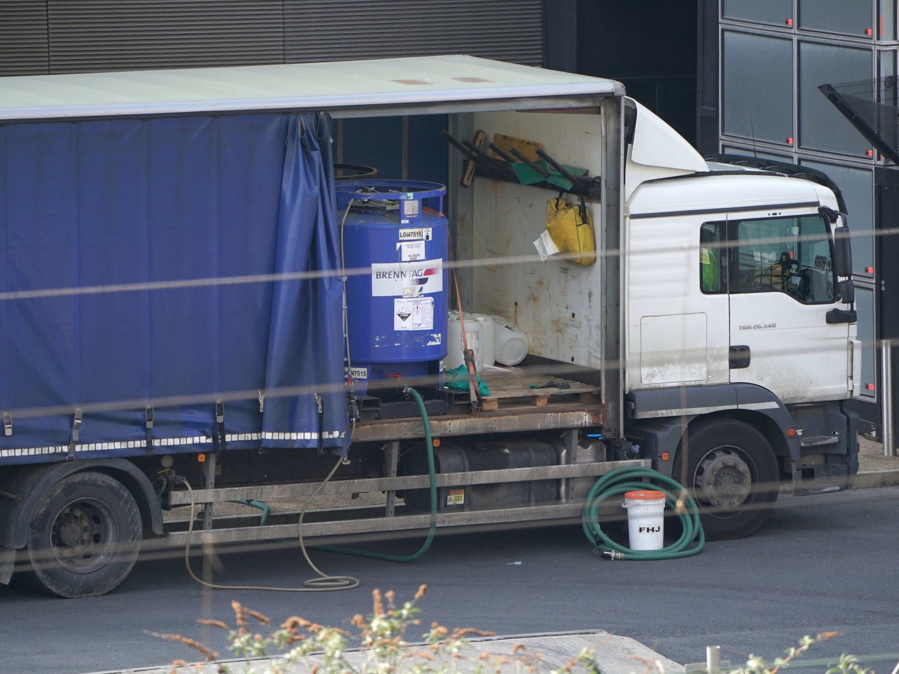 A lorry carrying a tank of hydrochloric acid was parked outside