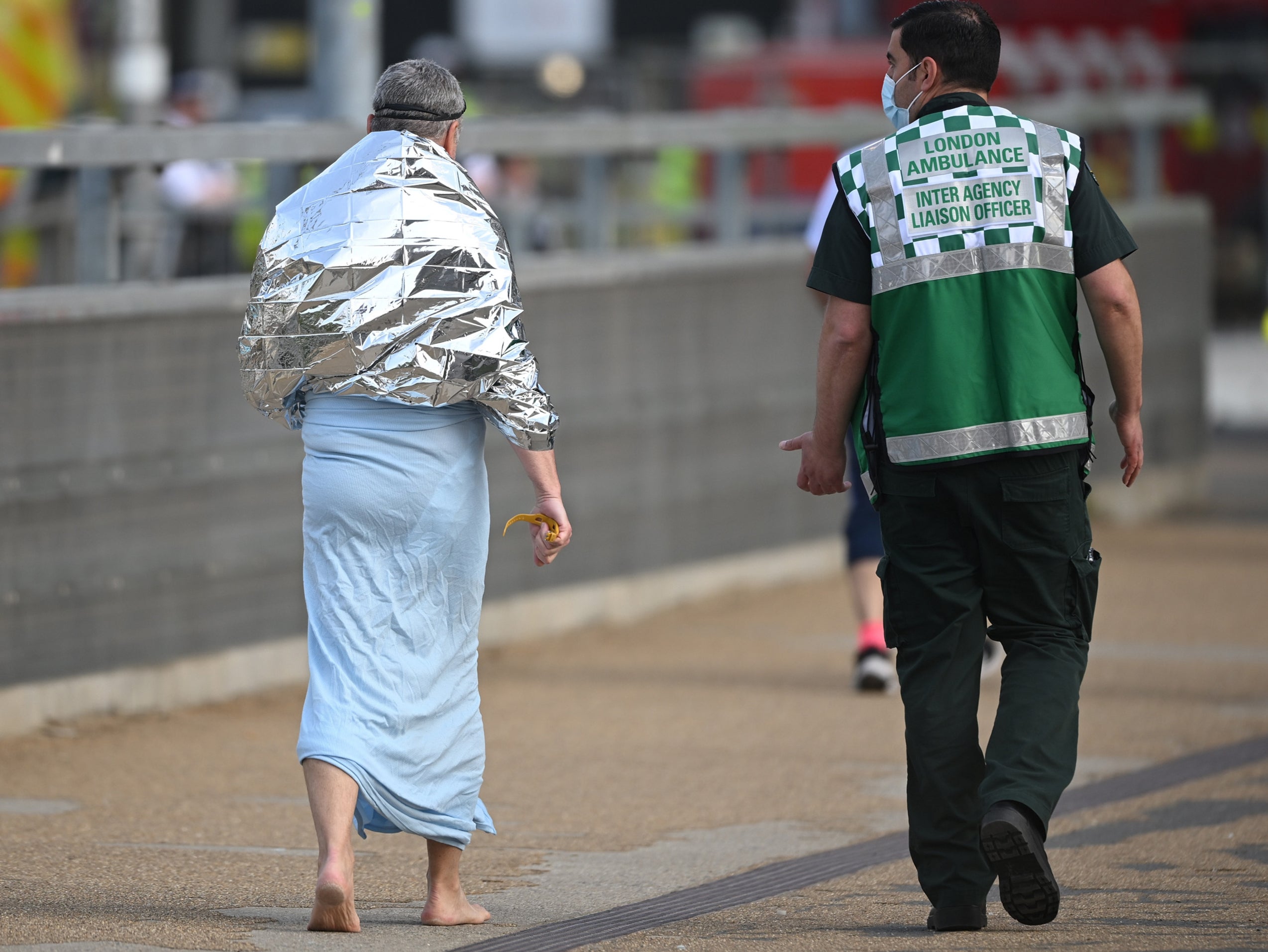 Swimmers were given foil blankets to stay warm