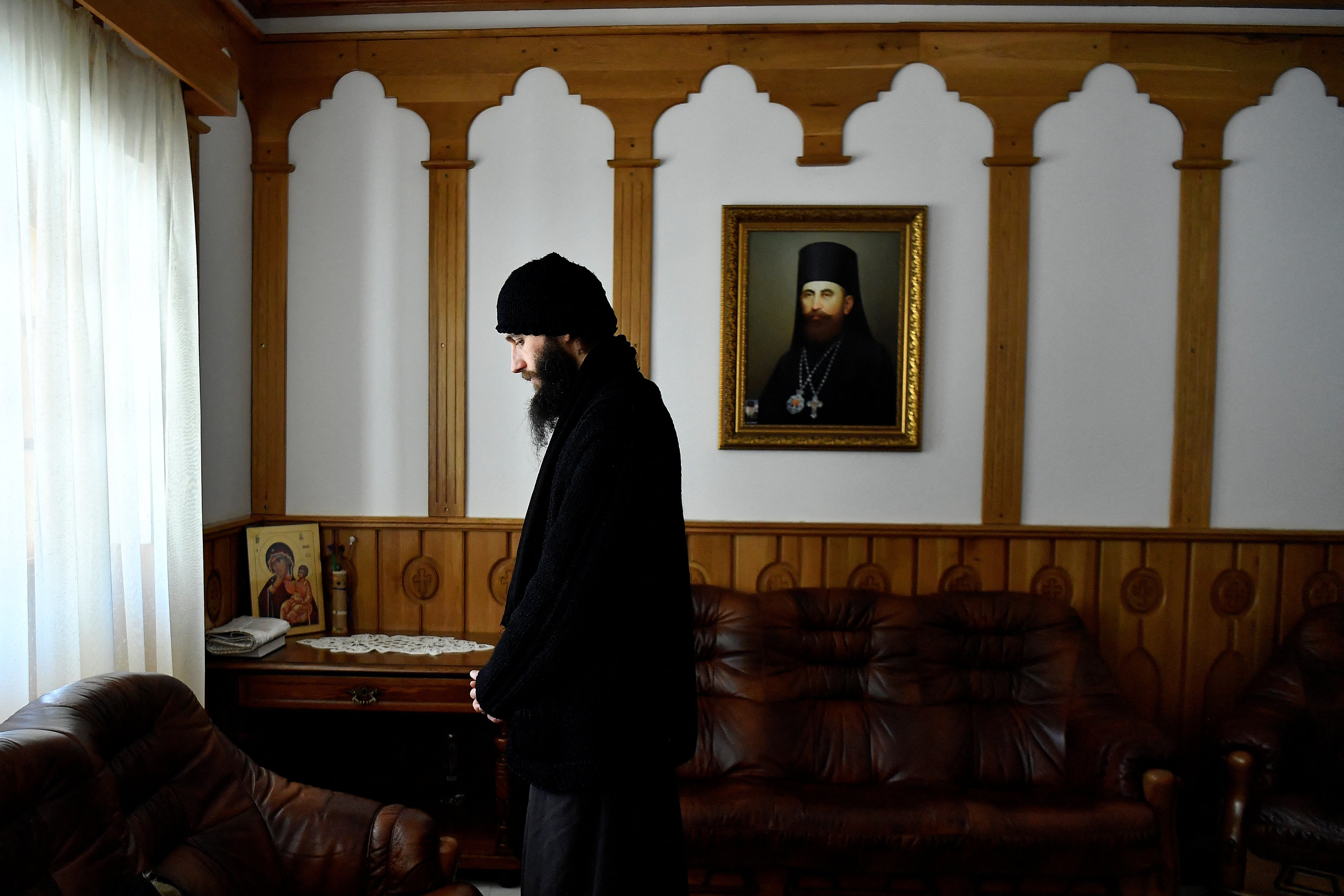 Father Gherasim Soca closes his eyes in reflection