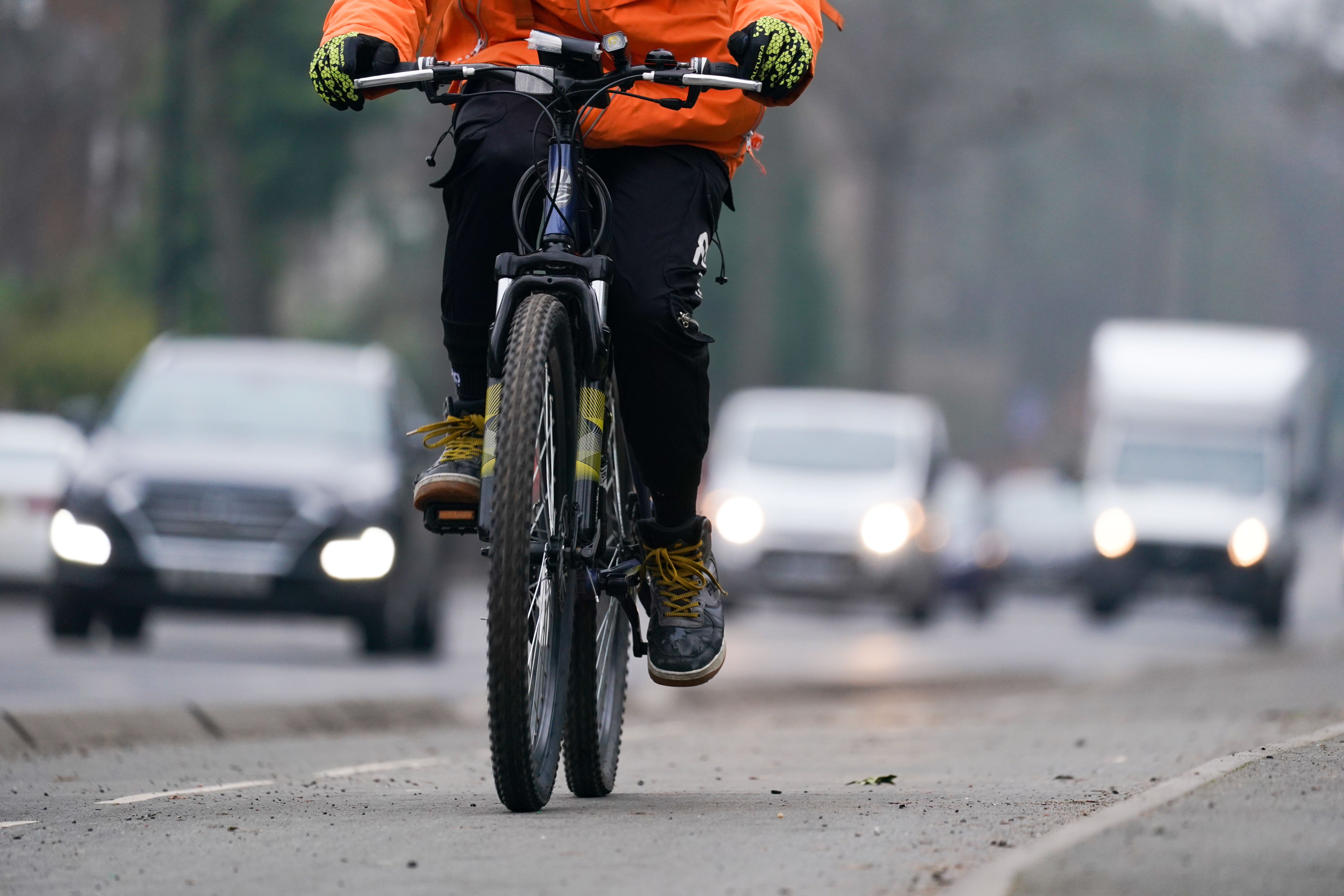 A cyclist (Jacob King/PA)