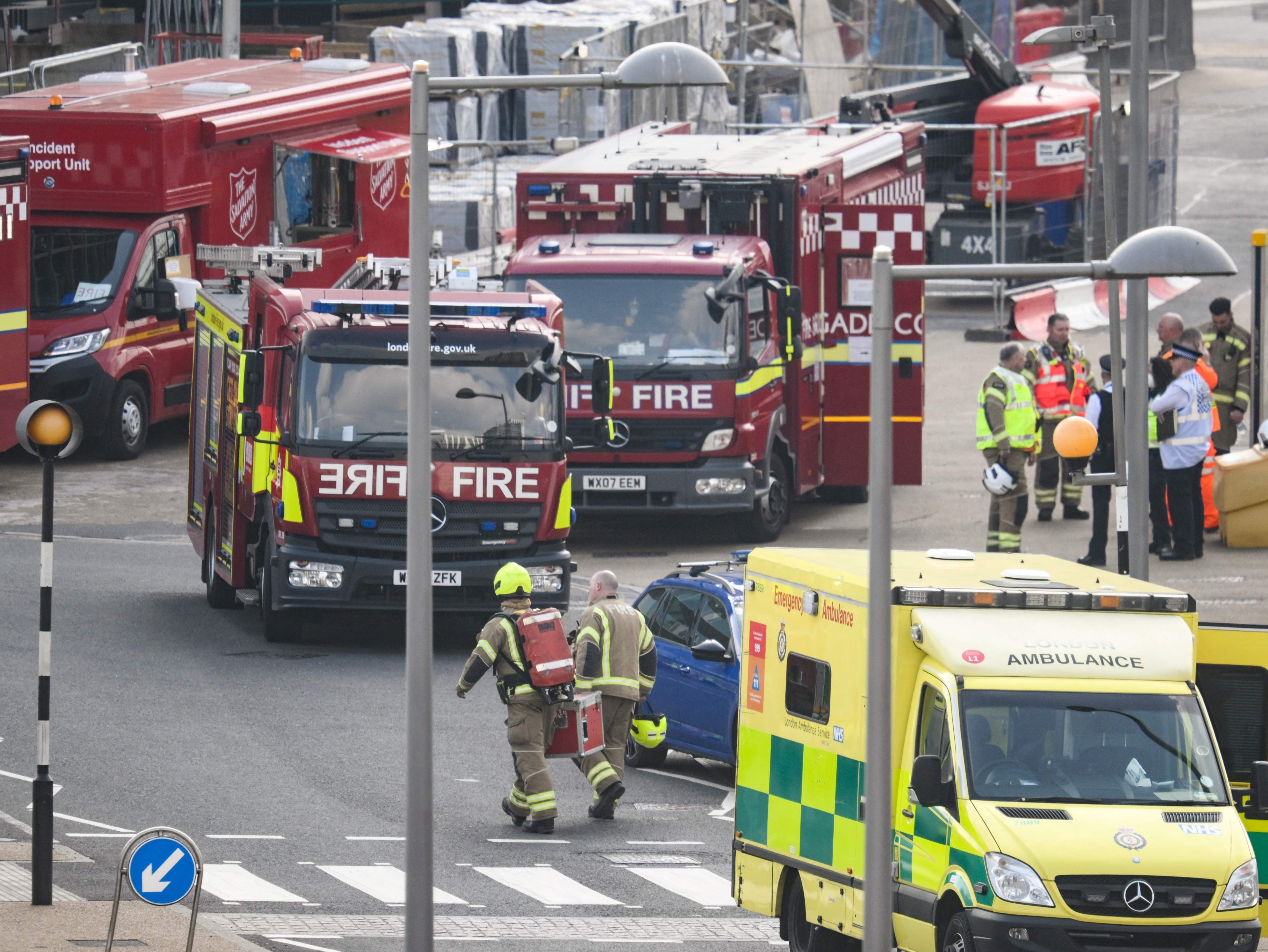 Police officers, firefighters and paramedics treated people made ill and worked to make the area safe