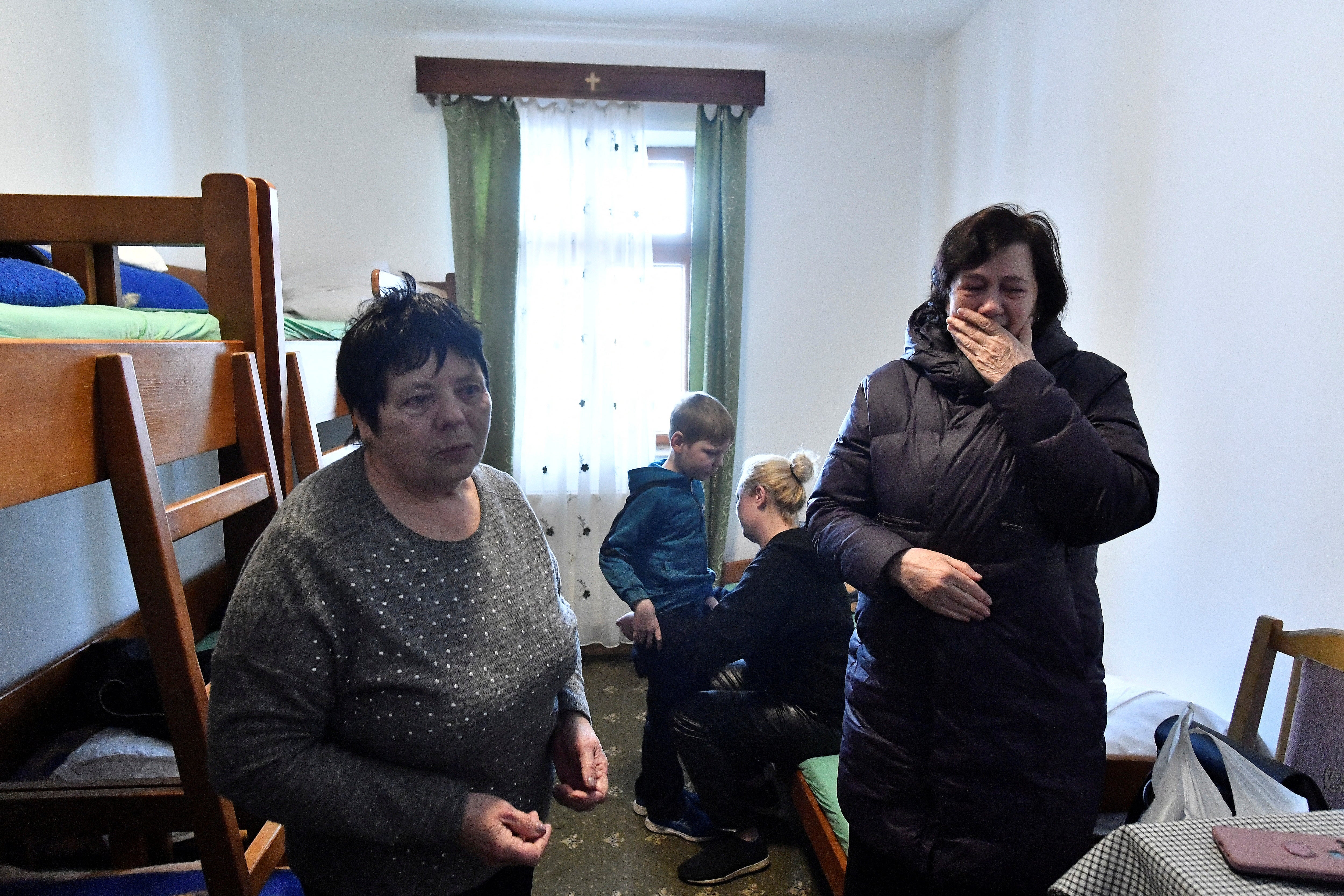 Svetlana, Raisa and Maksim with his mother Anna, in their room at the monastery, after fleeing Ukraine