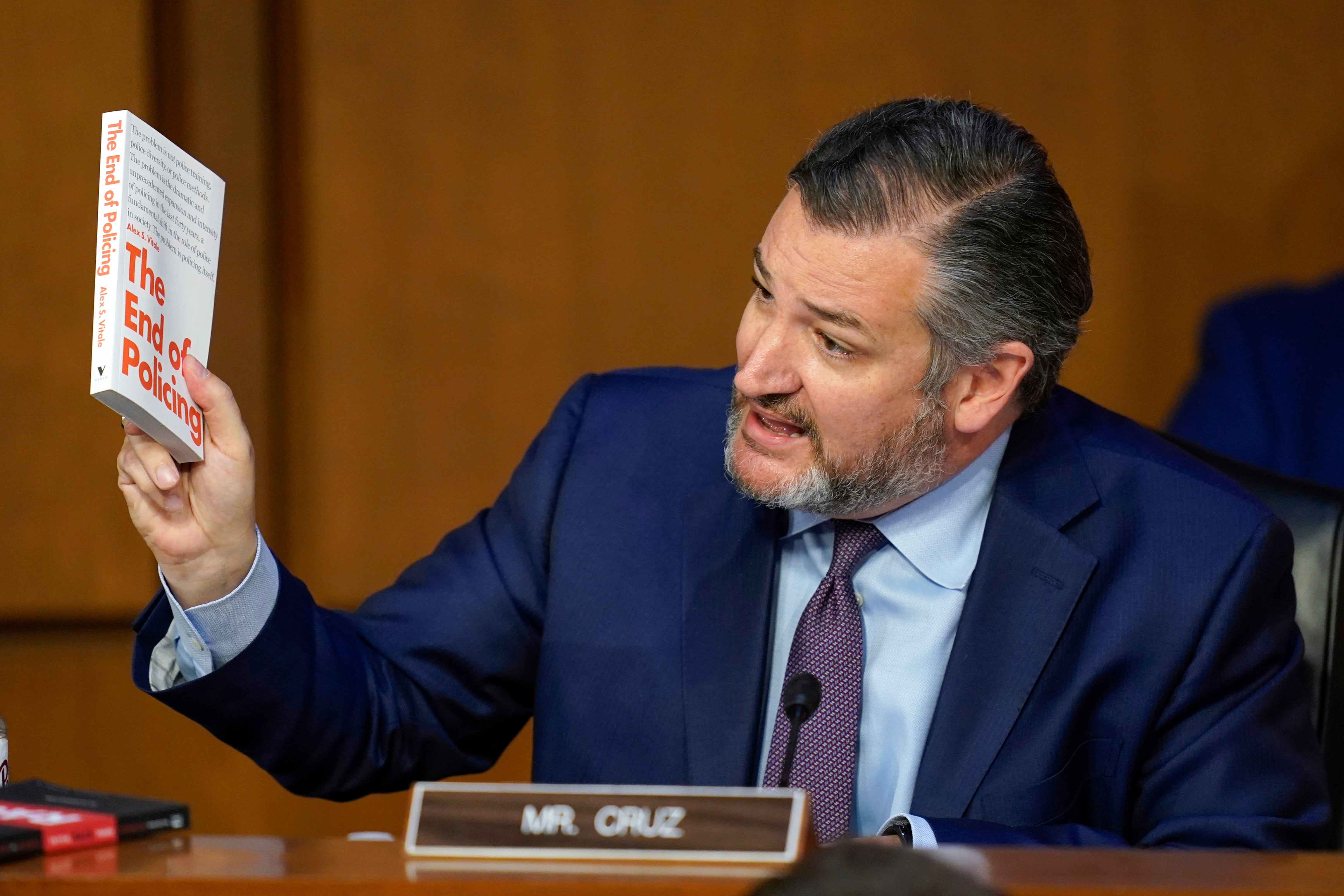 Sen. Ted Cruz, R-Texas, holds up a book as he questions Supreme Court nominee Judge Ketanji Brown Jackson during her confirmation hearing before the Senate Judiciary Committee Tuesday, March 22, 2022, on Capitol Hill in Washington. (AP Photo/Carolyn Kaster)