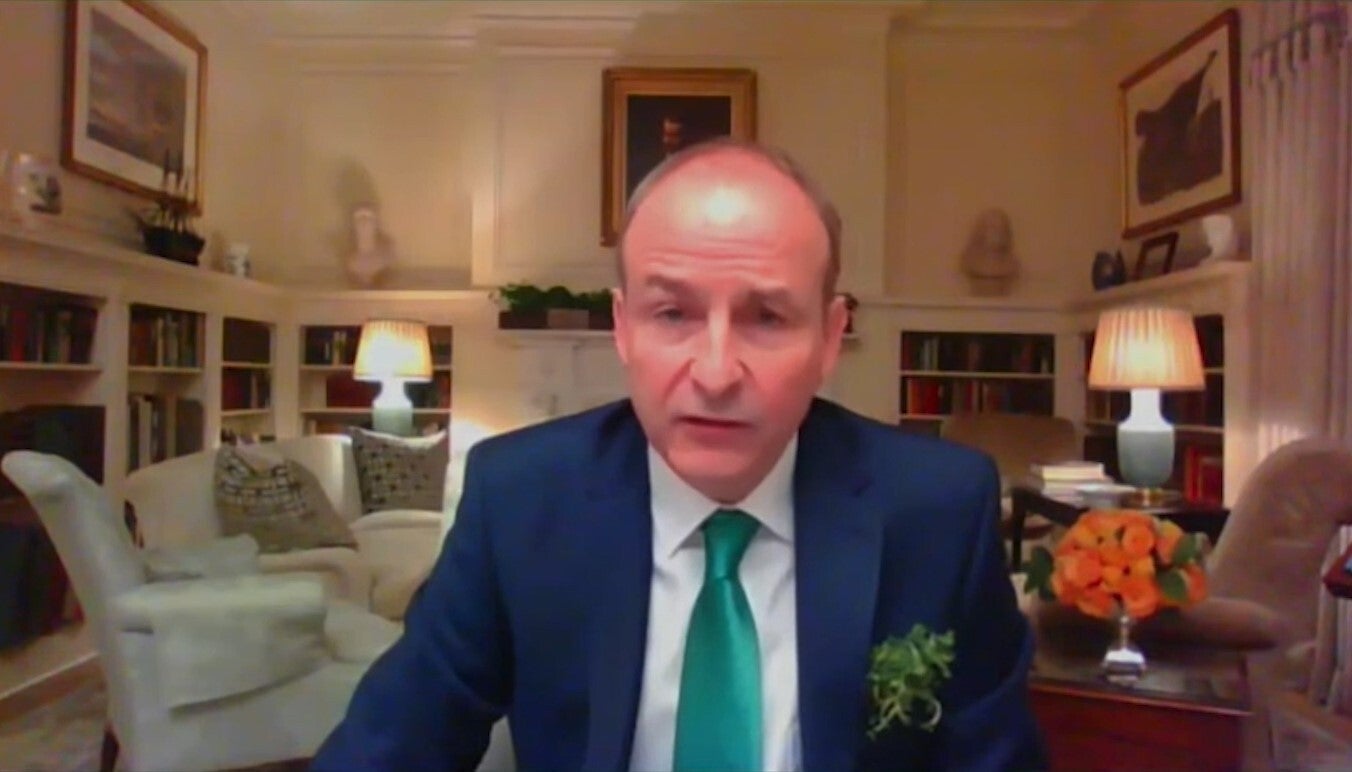 Handout screengrab from video issued by The White House of the bilateral meeting between Taoiseach Micheal Martin and US President Joe Biden via videolink. Mr Martin will now leave isolation to attend an EU summit (The White House/PA)