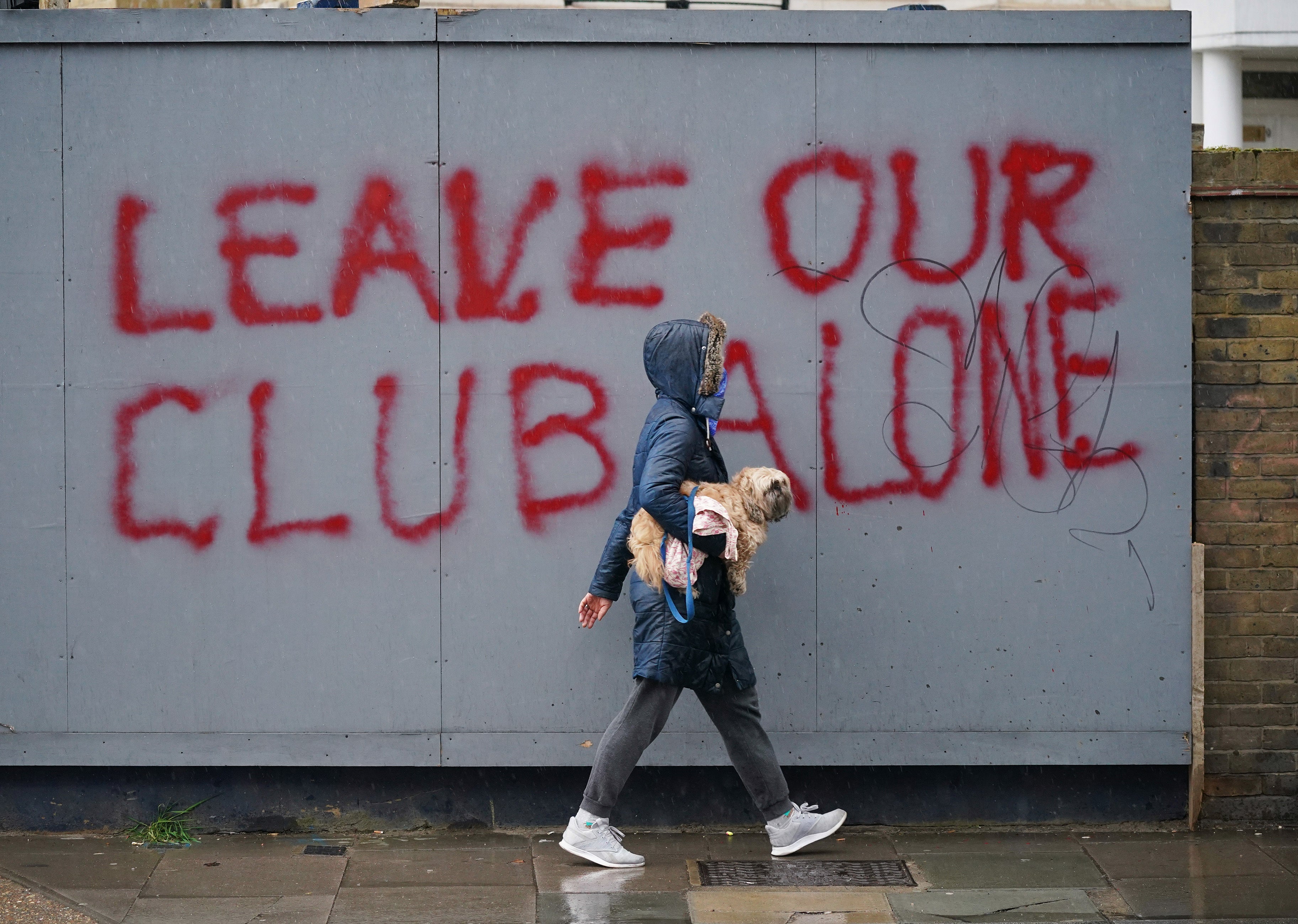 Graffiti close to Stamford Bridge shows the depth of feeling around Chelsea’s restrictive operating licence (Yui Mok/PA)