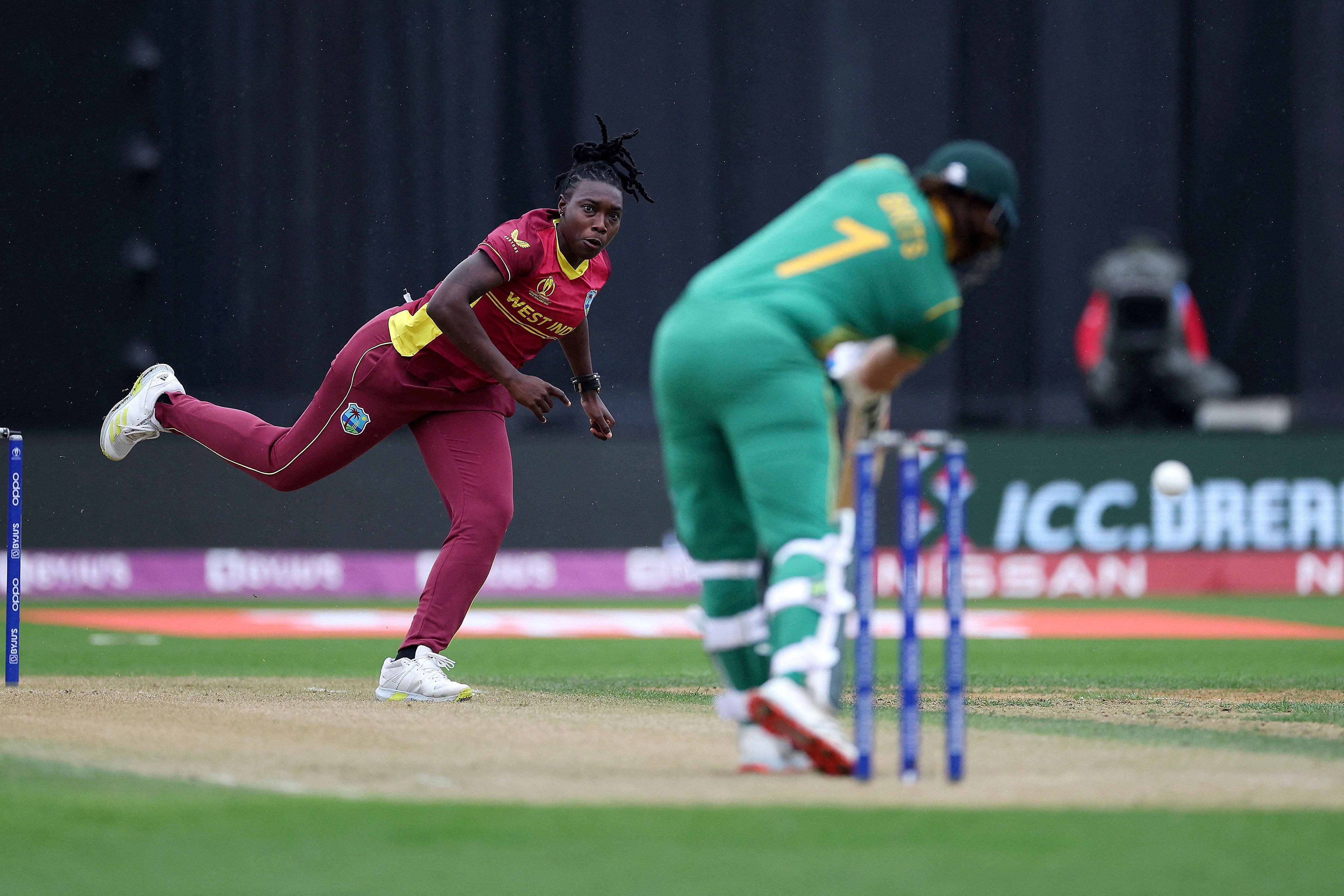 West Indies' Shamilia Connell (L) bowls to South Africa's Tazmin Brits