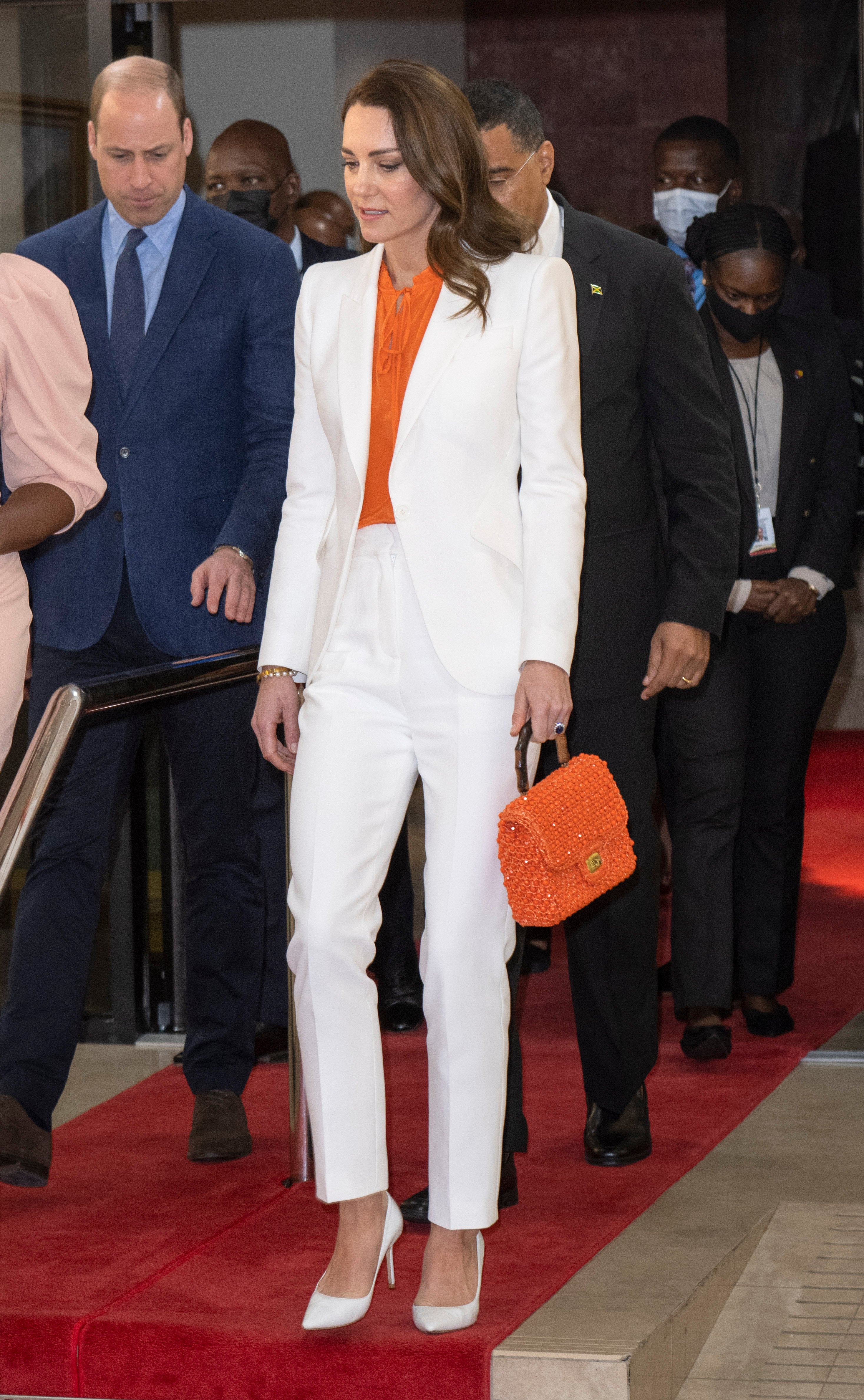 The Duchess opted for a chic white suit