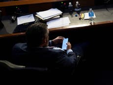 Ted Cruz photographed checking his Twitter mentions after ‘performative tantrum’ at Supreme Court hearing 