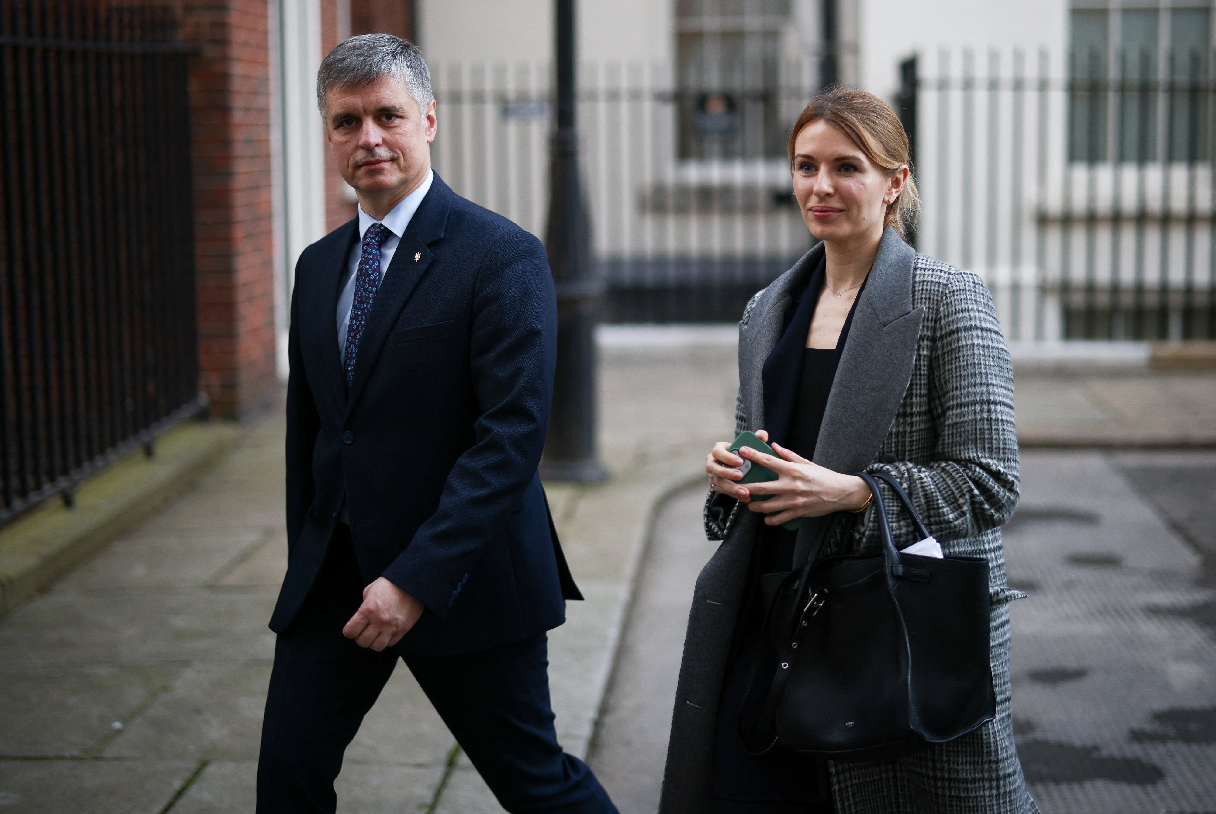 Lesia Vasylenko (R) walks with Vadym Prystaiko, Ukraine’s ambassador to the UK, in London on 17 March, 2022