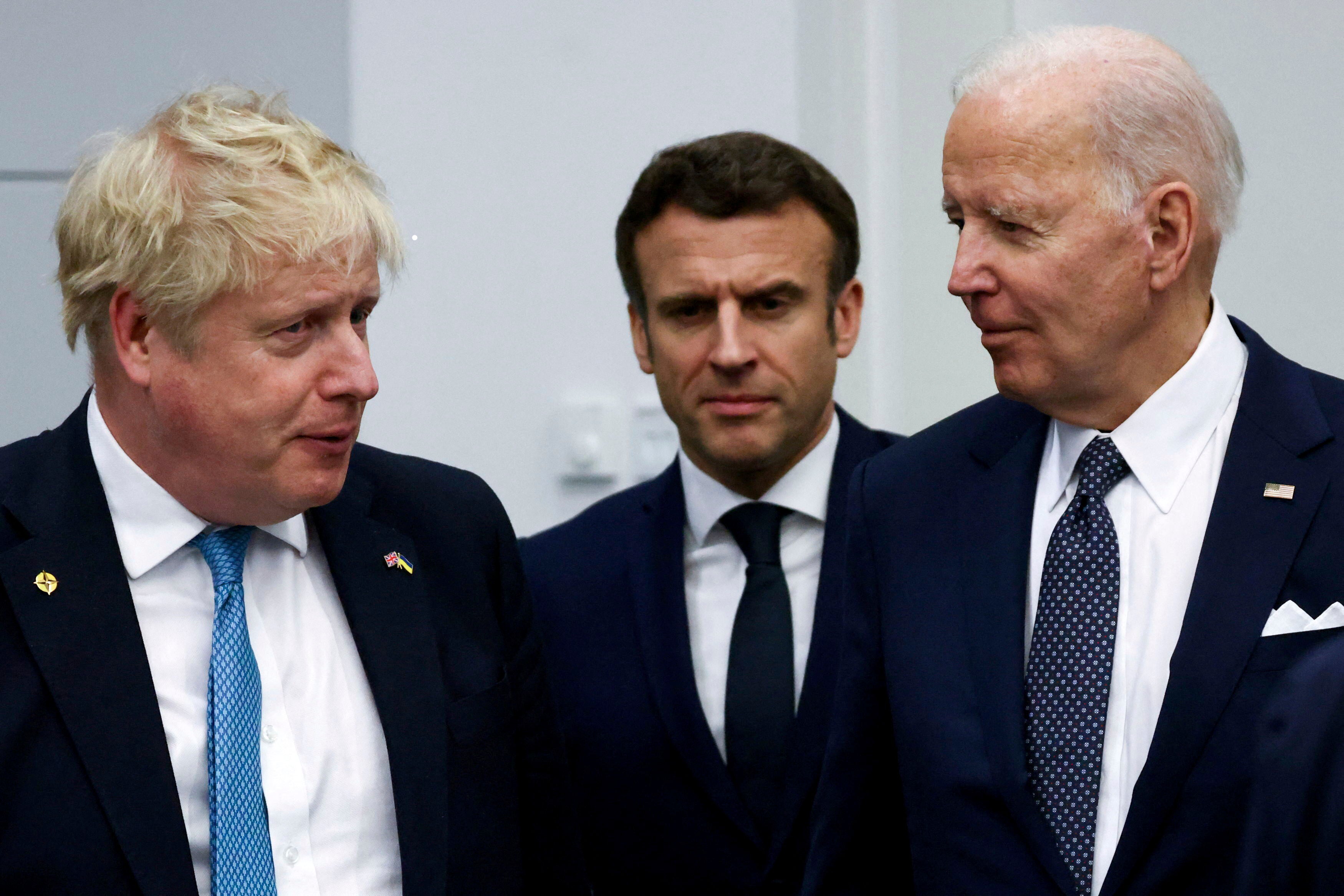 Boris Johnson, Emmanuel Macron and Joe Biden at the G7 summit in Brussels on Thursday