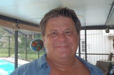 Man dies after hitting 11-foot alligator with his car on Florida road