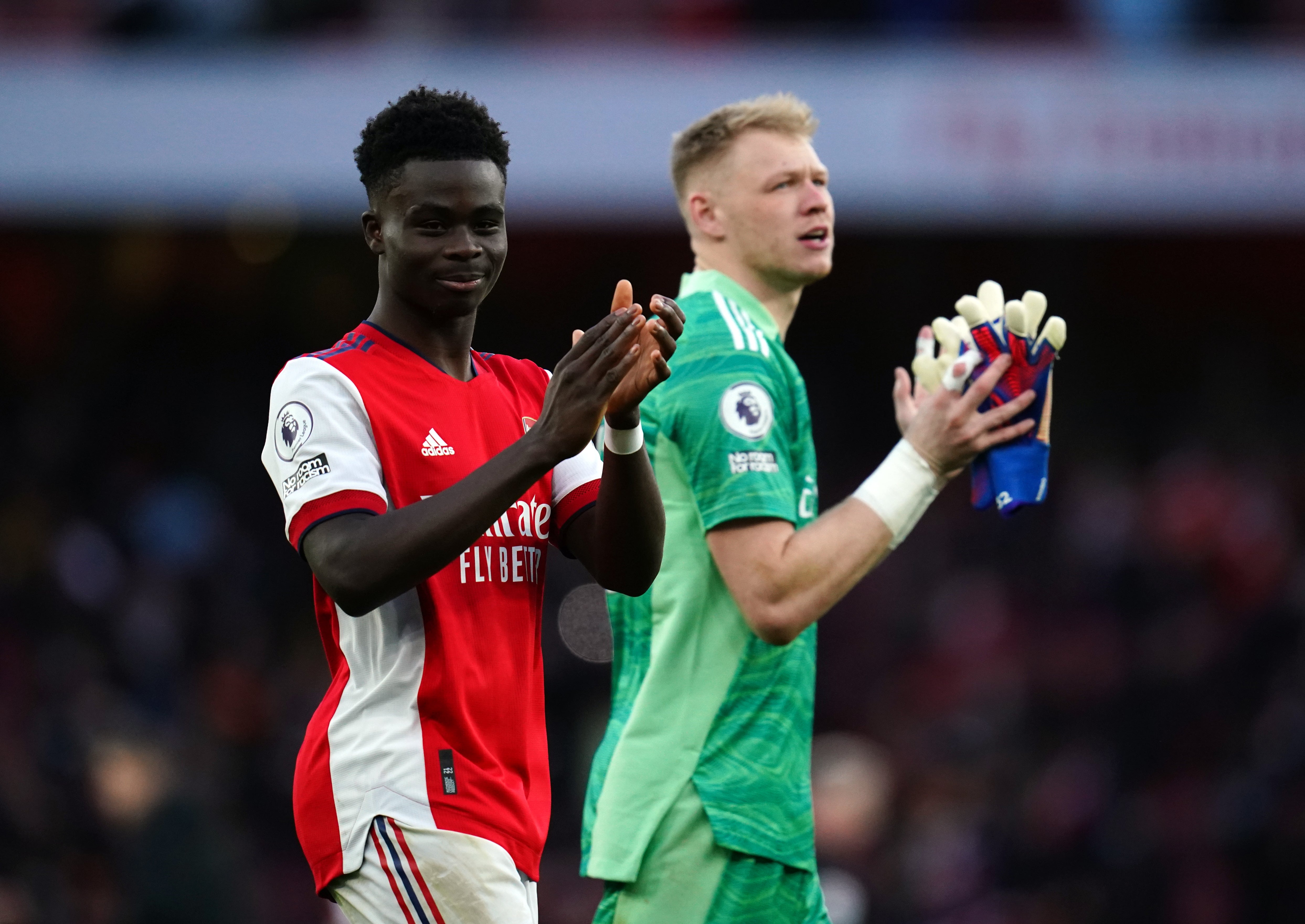 Arsenal pair Bukayo Saka (left) and Aaron Ramsdale have pulled out of the England squad. (John Walton/PA)