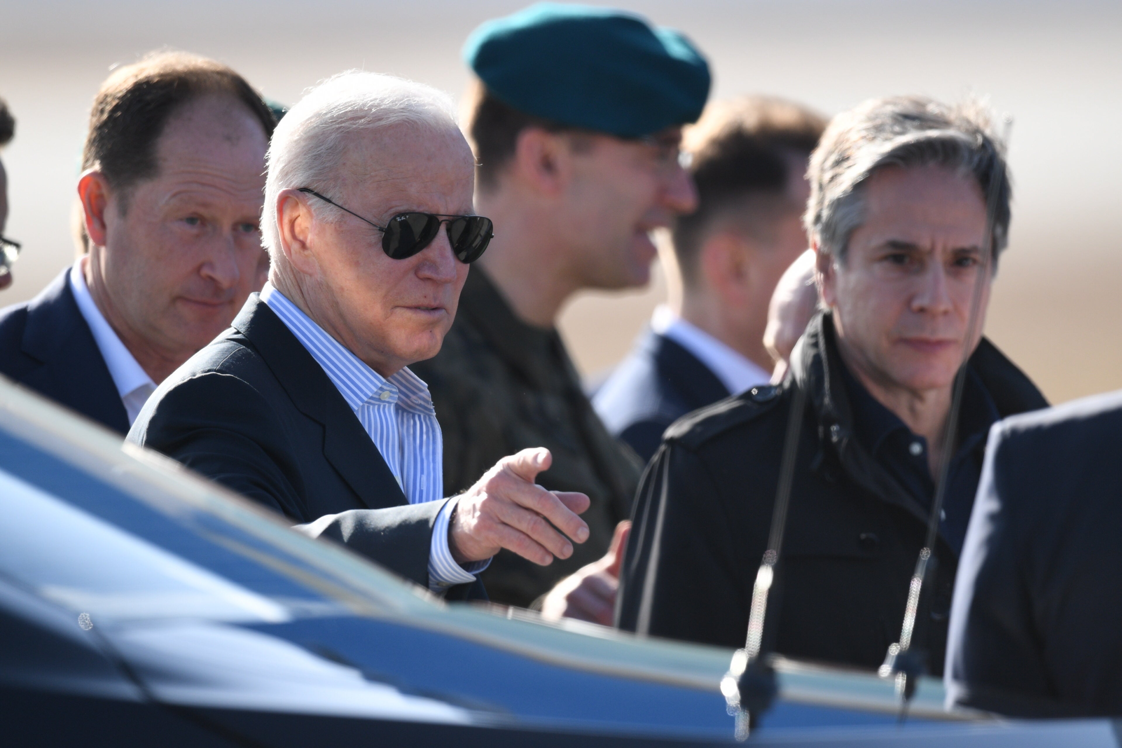 President Joe Biden (C) and US Secretary of State Antony Blinken (R) after arriving at the airport in Jasionka, near Rzeszow, southern Poland, 25 March 2022