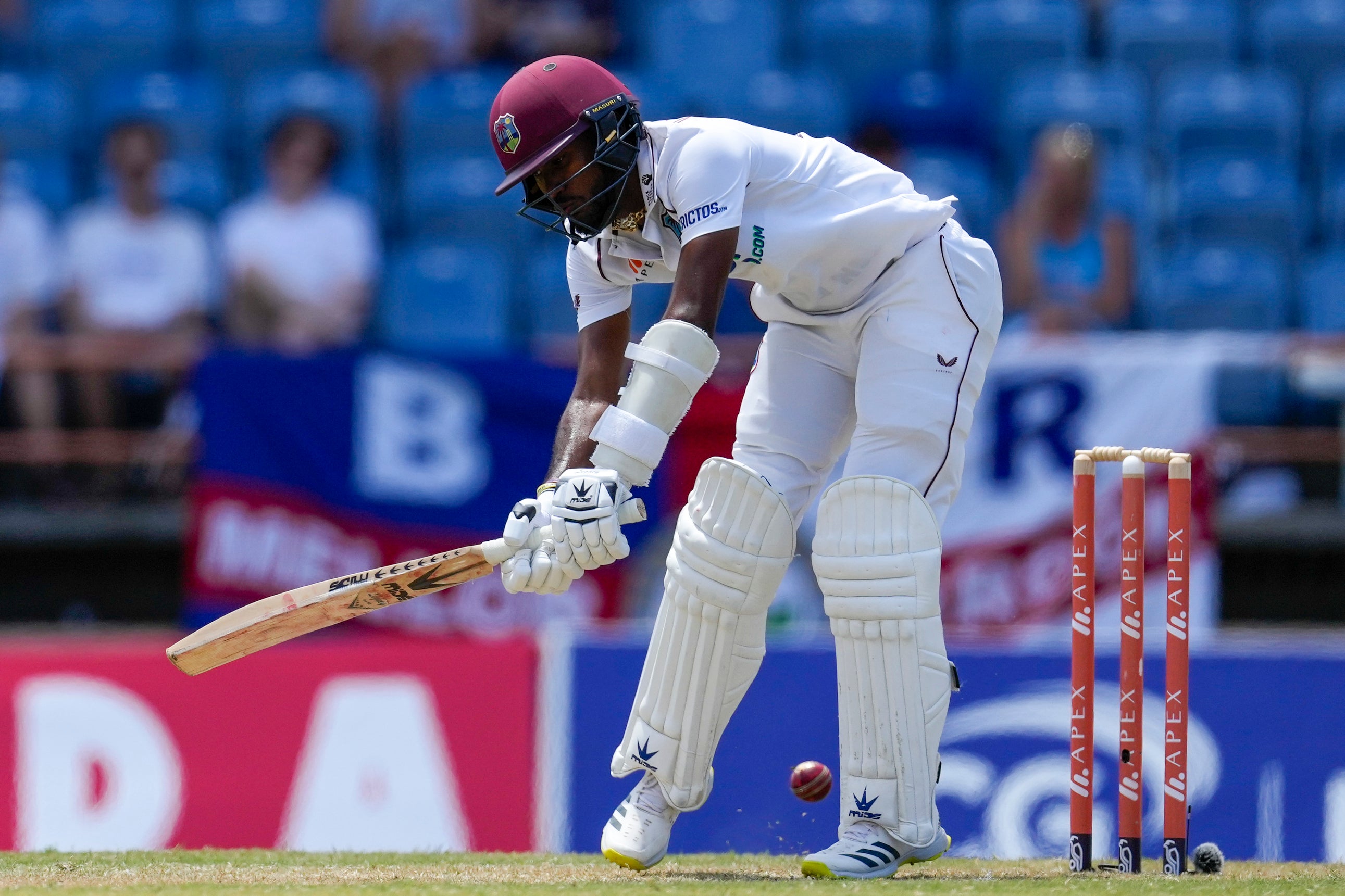 Kraigg Brathwaite was dismissed by one that kept low (Ricardo Mazalan/AP)