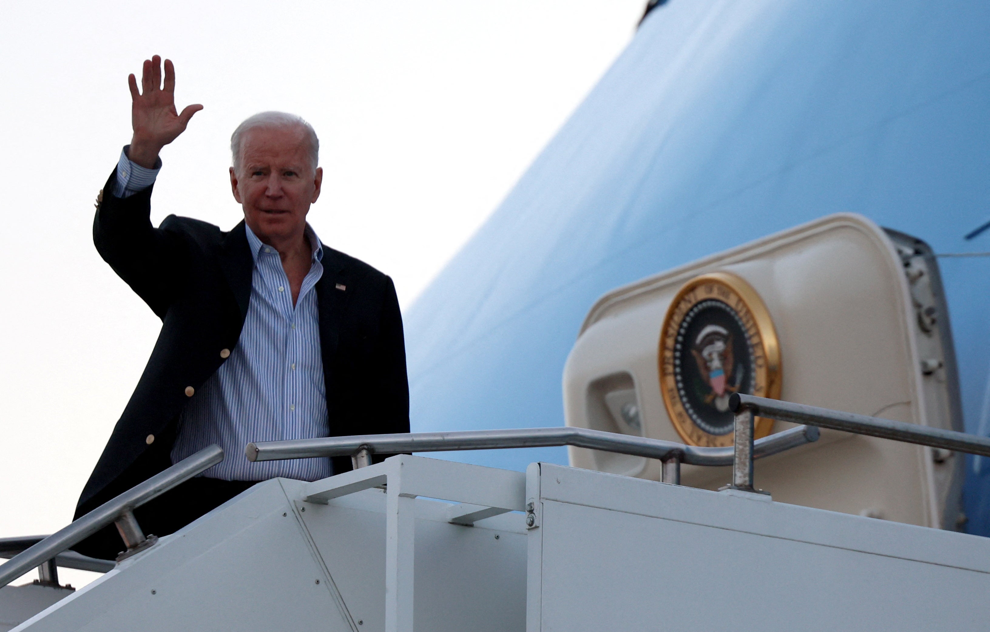 President Joe Biden boards Air Force One to fly to Warsaw, at Rzeszow-Jasionka Airport