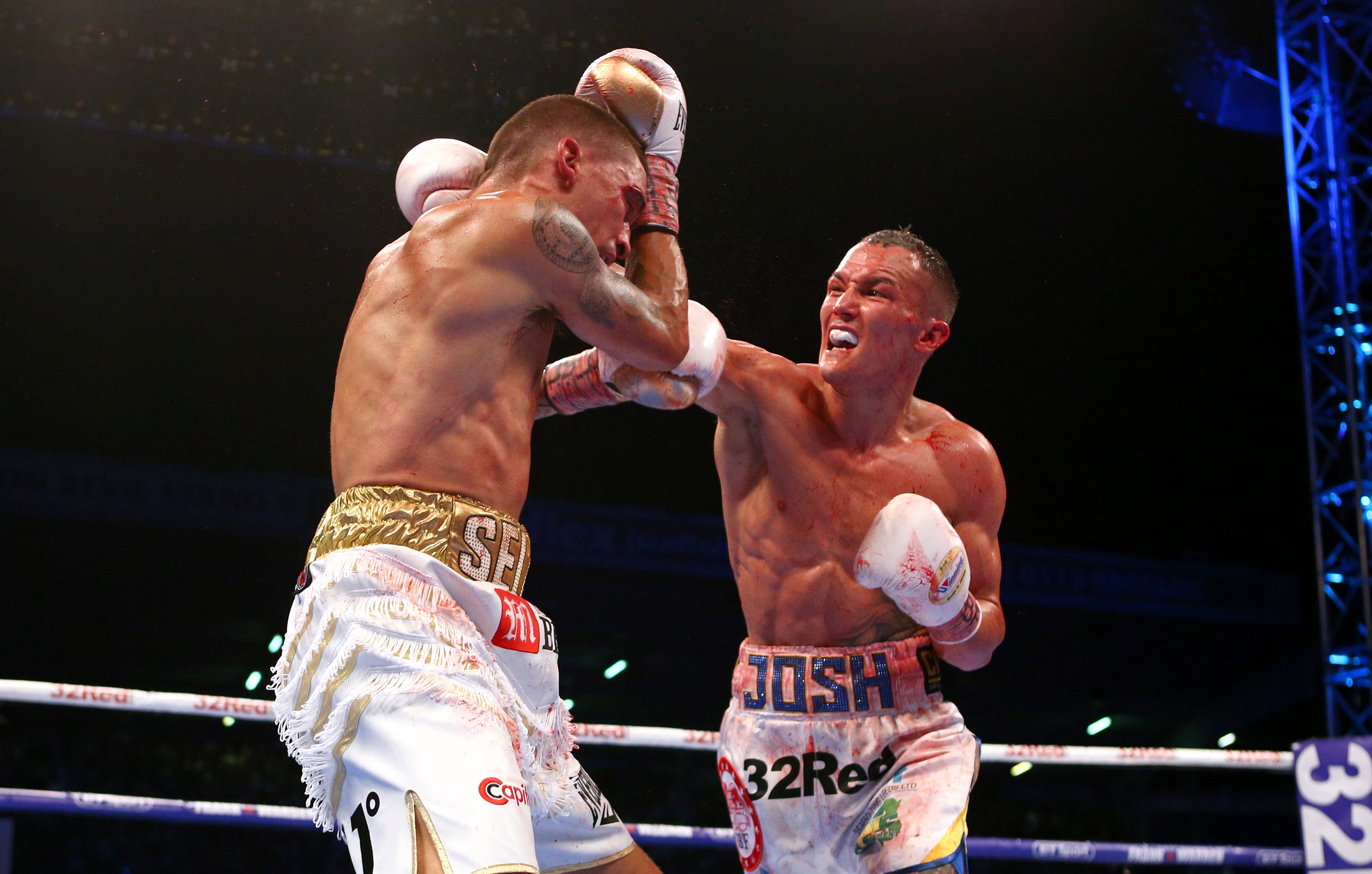 Josh Warrington, right, won the IBF featherweight title in 2018 with a spilt-decision victory over Lee Selby at Elland Road (Dave Thompson/PA)