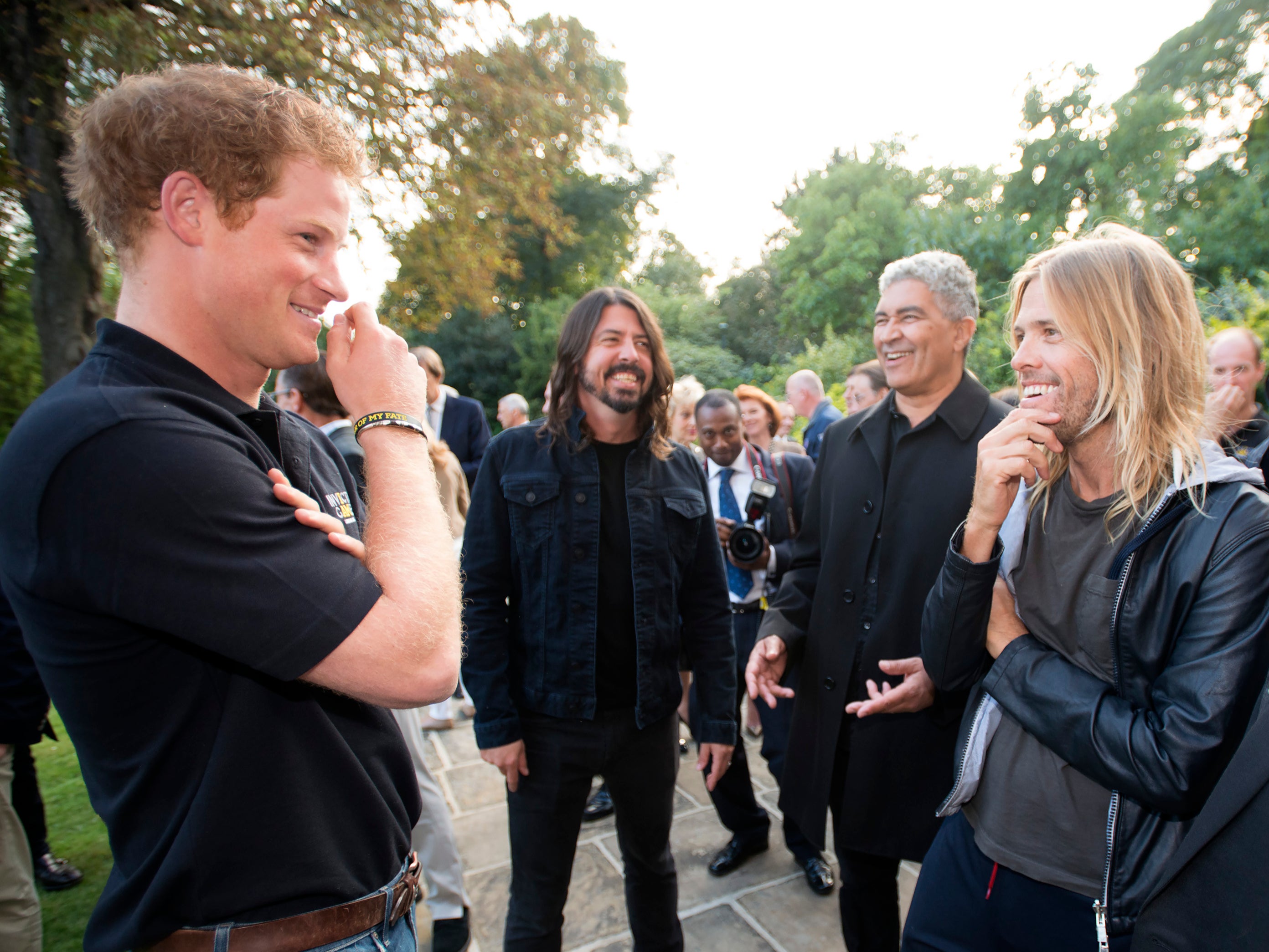 Harry meets Hawkins (right) and the members of Foo Fighters in 2014