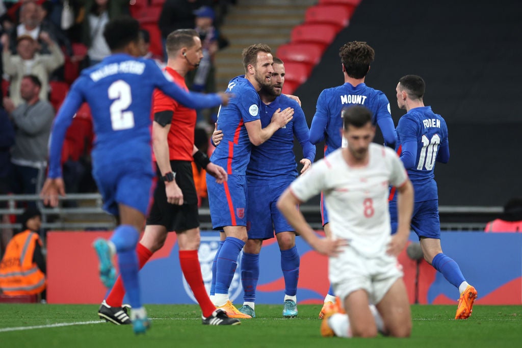 Luke Shaw celebrates with teammates as he pulled England level at 1-1