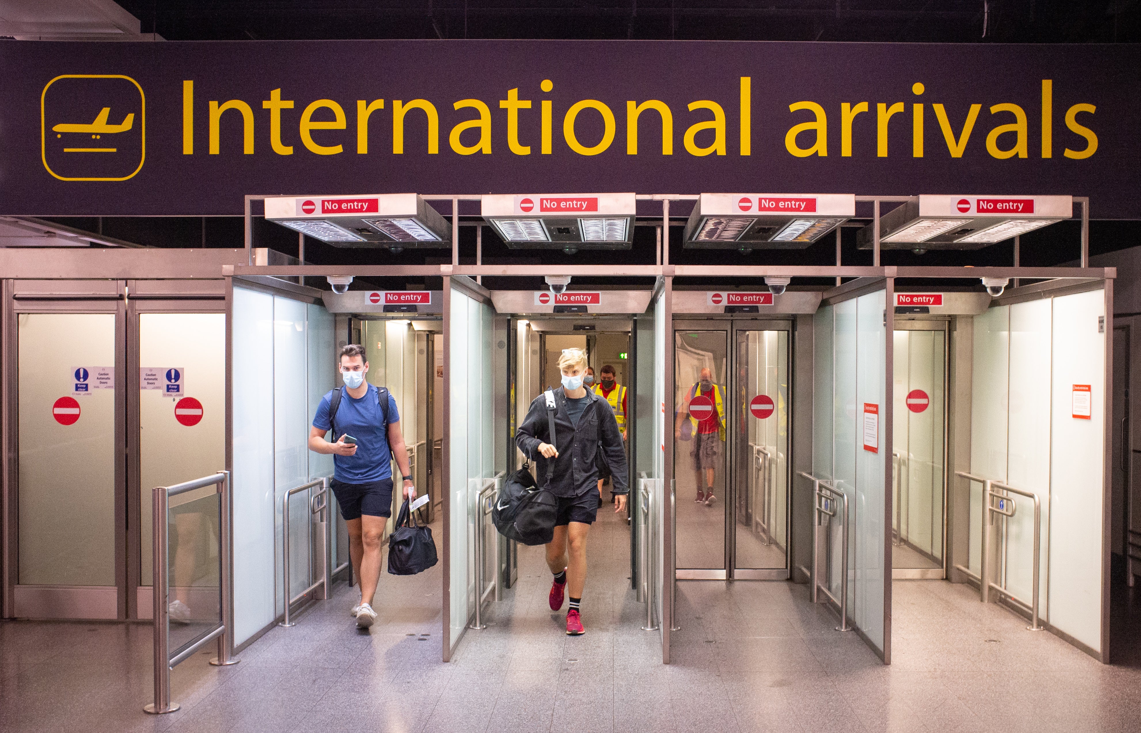 Passengers arrive at Gatwick Airport (PA)