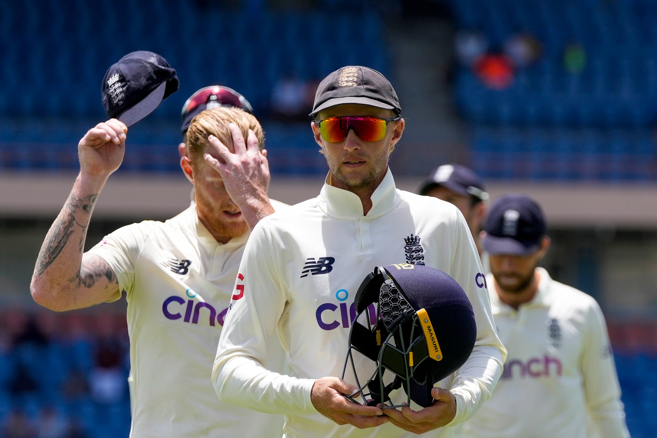 England’s captain Joe Root leads his team off the field (Ricardo Mazalan/AP)