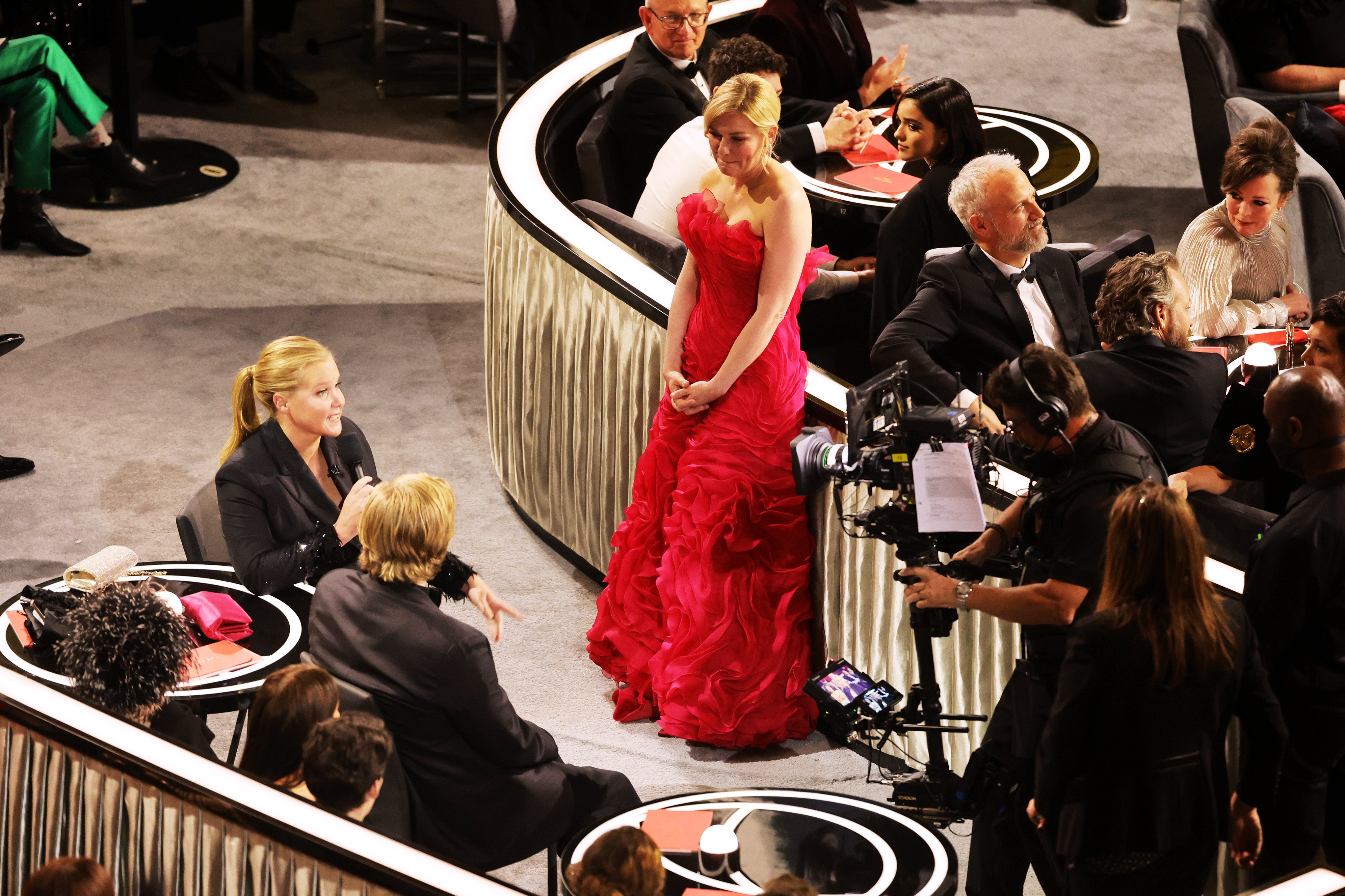 Co-host Amy Schumer, Jesse Plemons, and Kirsten Dunst are seen during the 94th Annual Academy Awards