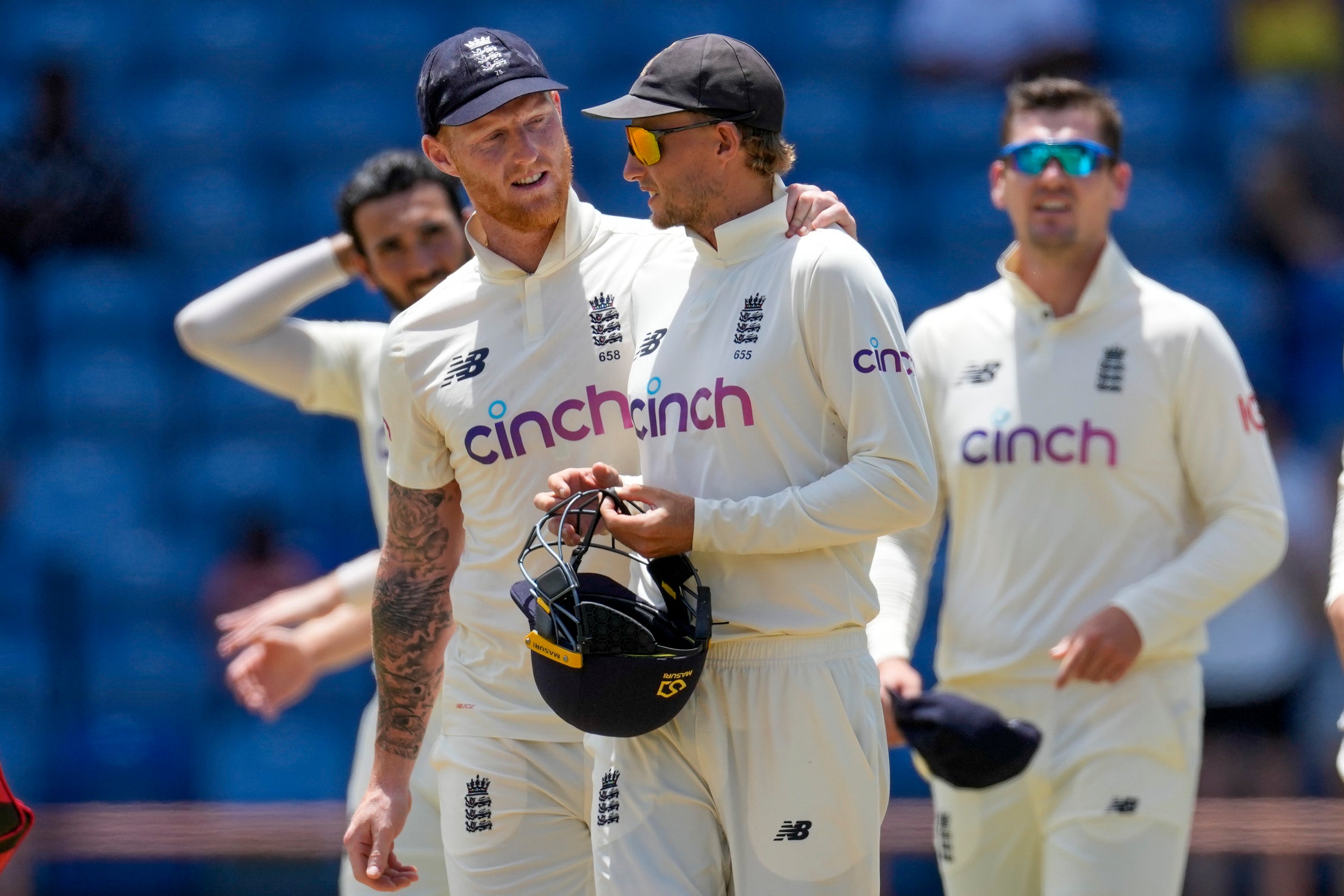 Ben Stokes (left) consoles Root (right). (Ricardo Mazalan/AP)