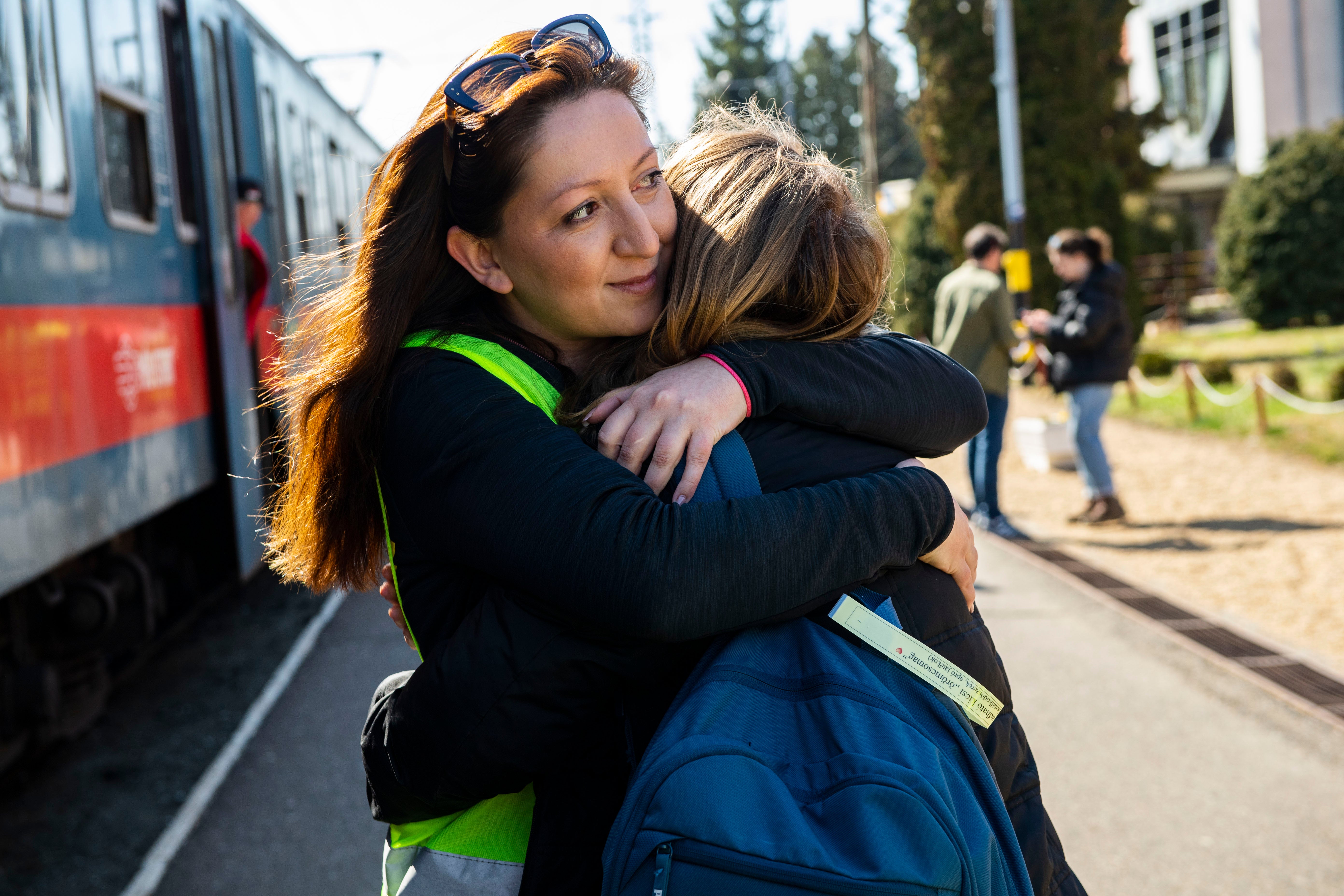 The difference in mood between the fraught, exhausted, tense refugees arriving and those leaving just a little lighter a few hours later was palpable