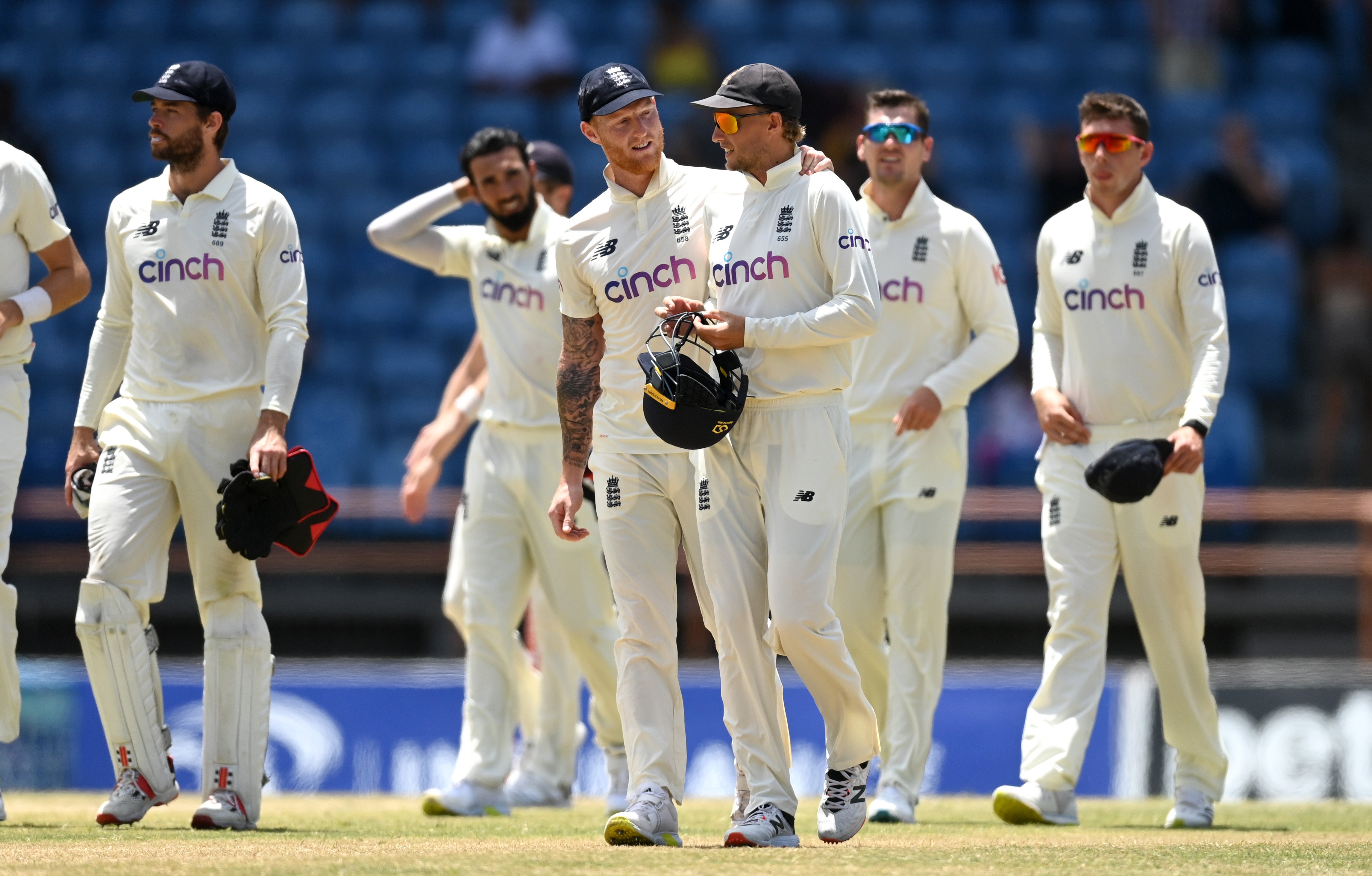 England captain Joe Root is consoled by Ben Stokes