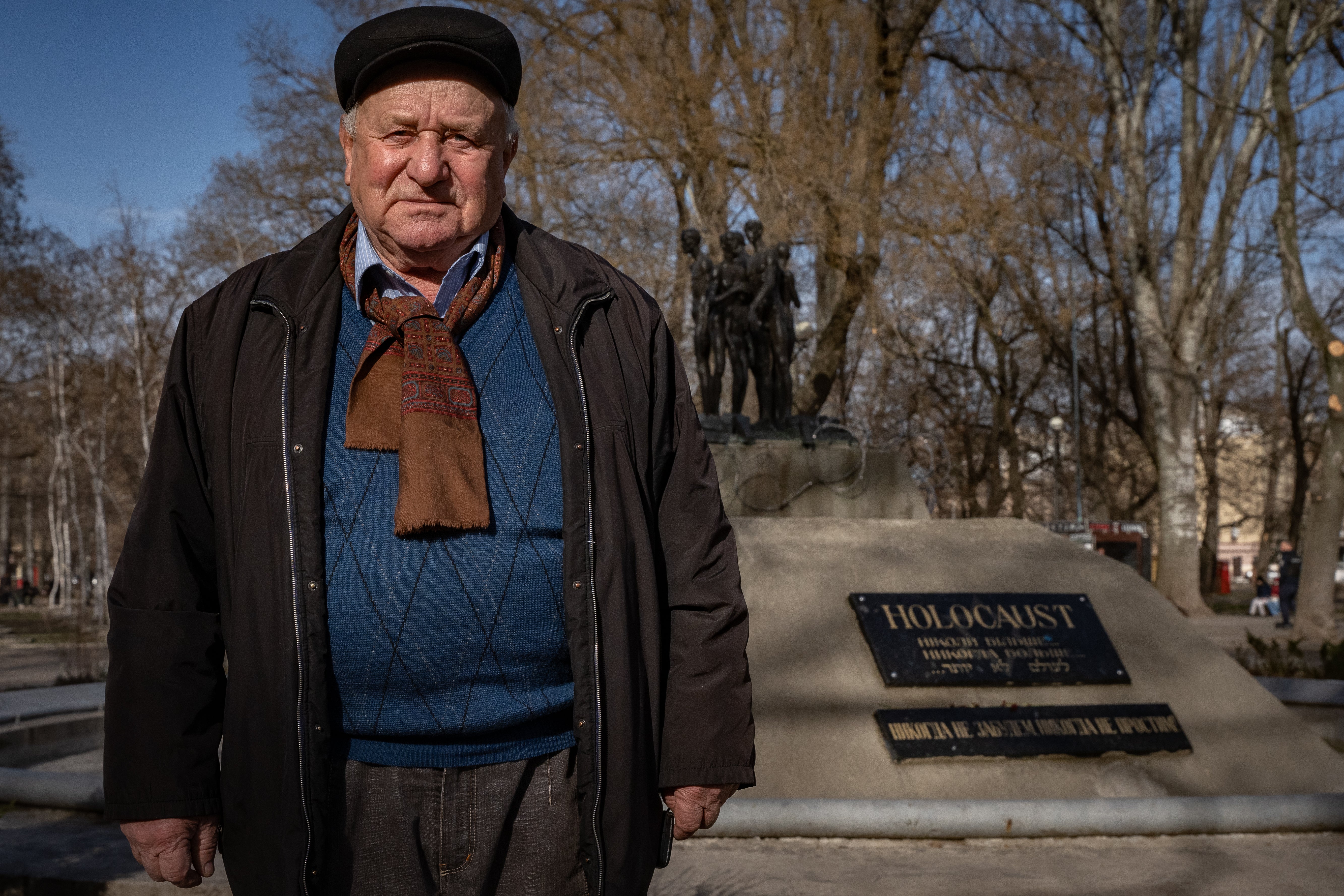 Yuri, a half-Russian Holocaust survivor and former Soviet Union captain, vows to stay and defend his hometown of Odesa