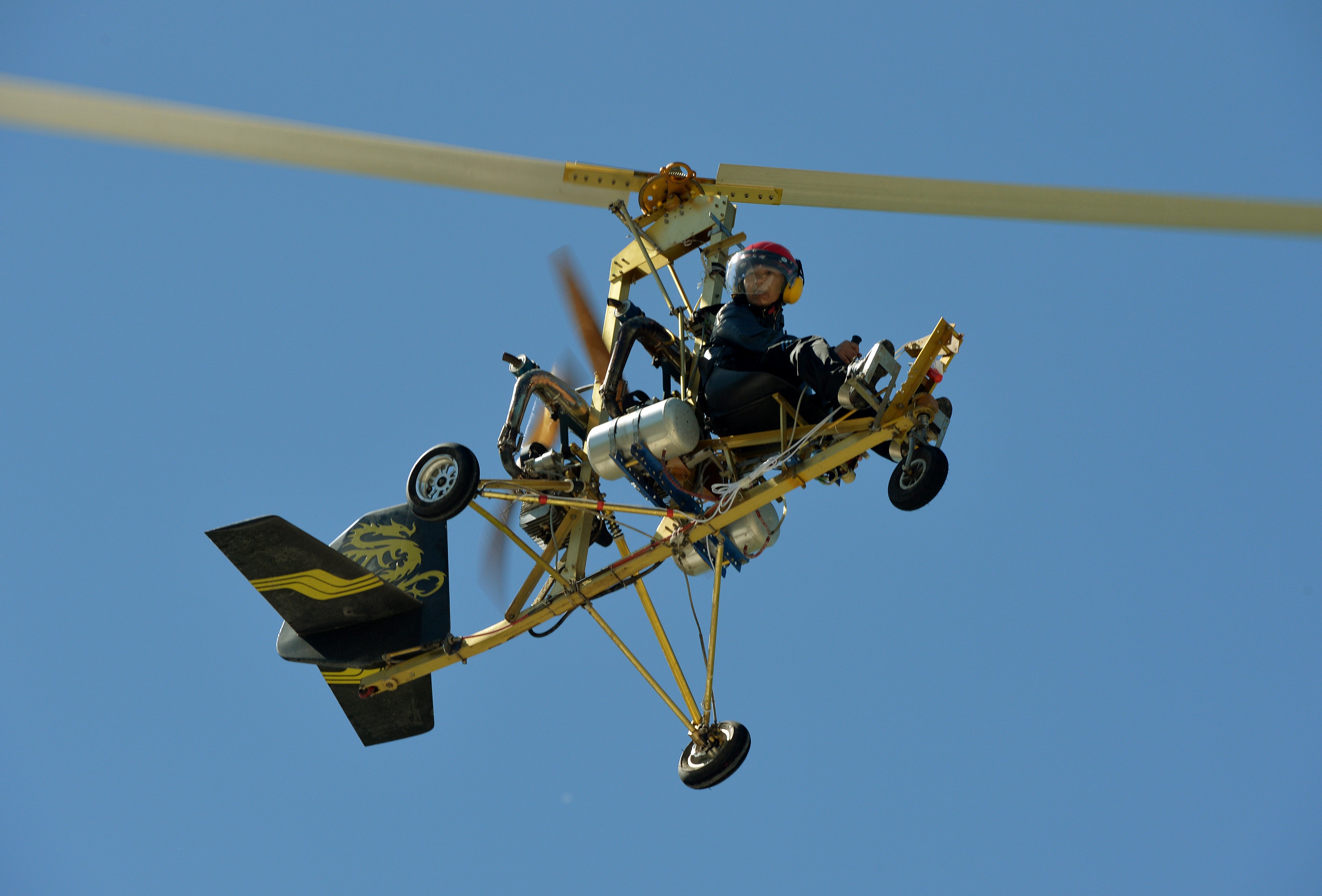 (Representative) A man flying his home made helicopter in east China's Zhejiang province flying in 2013