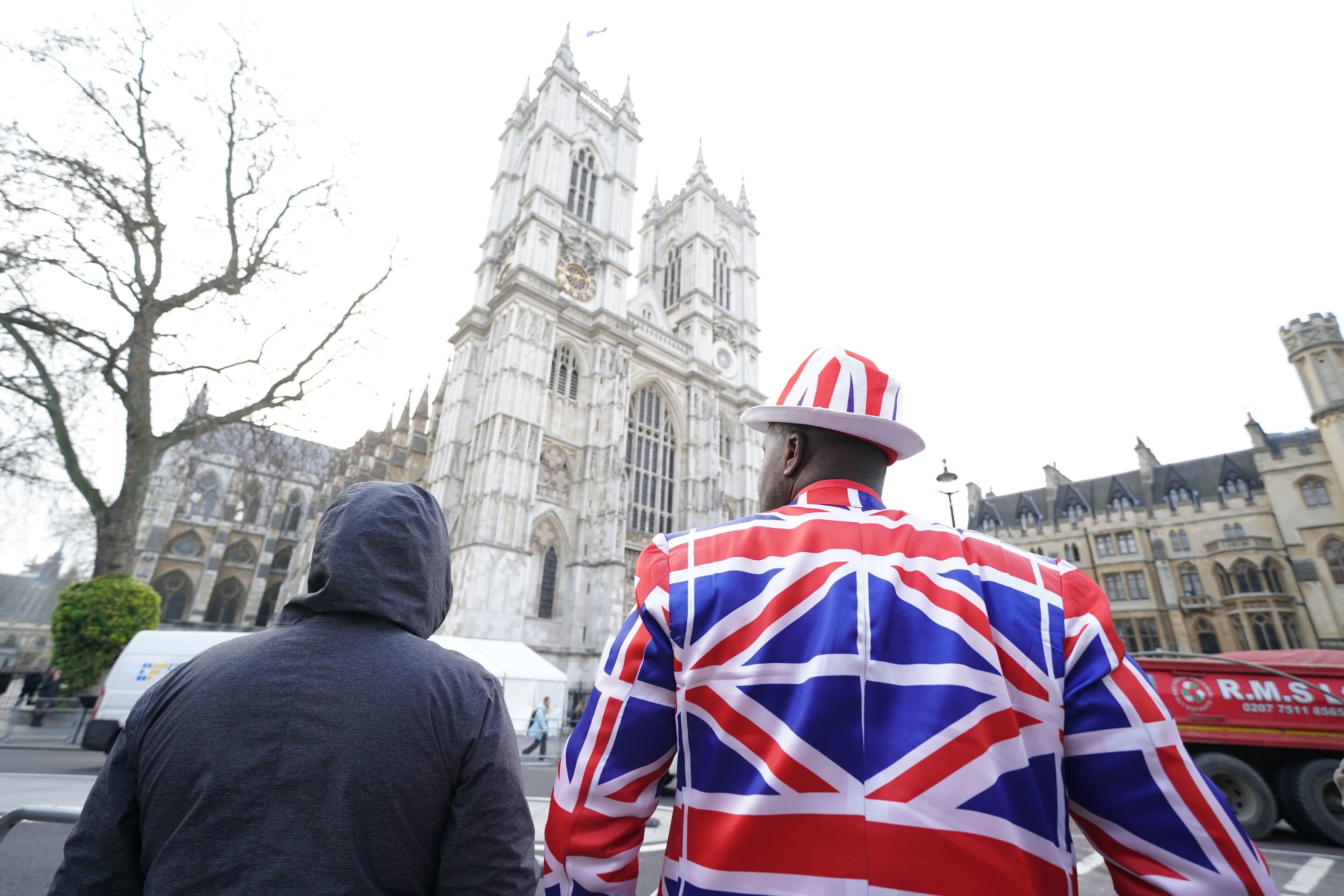 Royal fans including Joseph Afrane (right) wait for the arrivals for a Service of Thanksgiving for the life of the Duke of Edinburgh