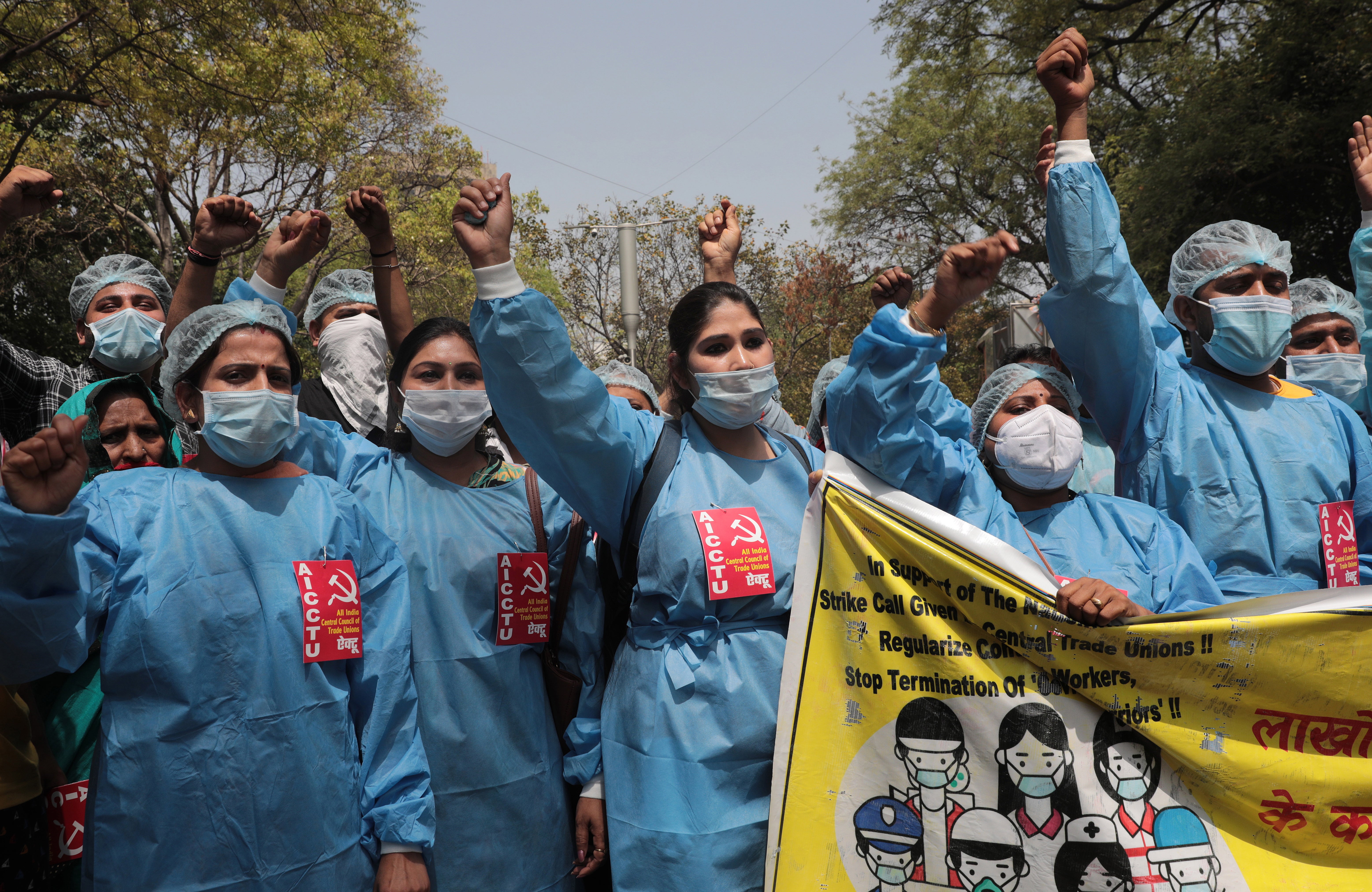 Indian frontline workers take part in a protest during the second day of a two-day long nationwide strike in New Delhi, India