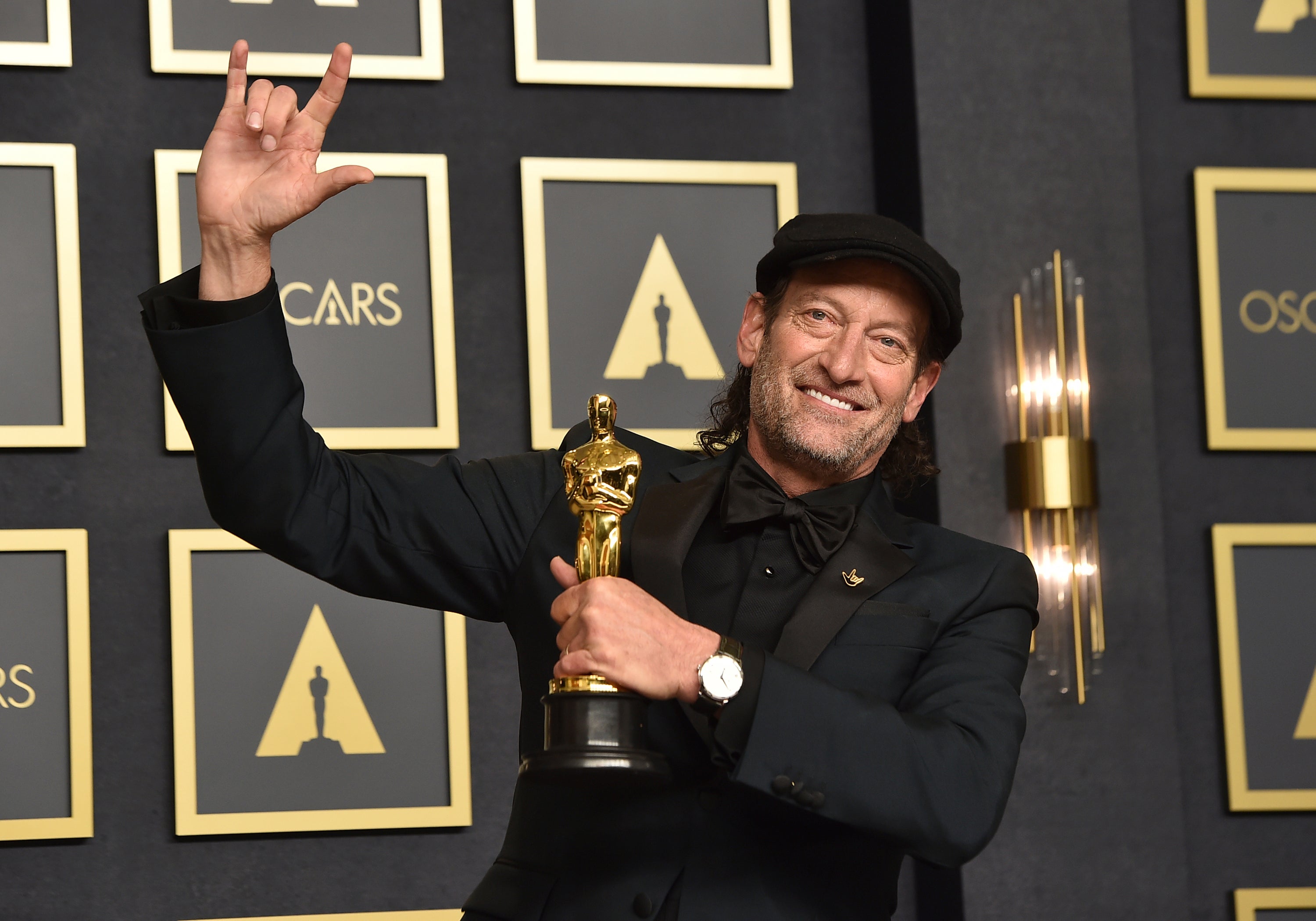 Troy Kotsur with his Oscar award