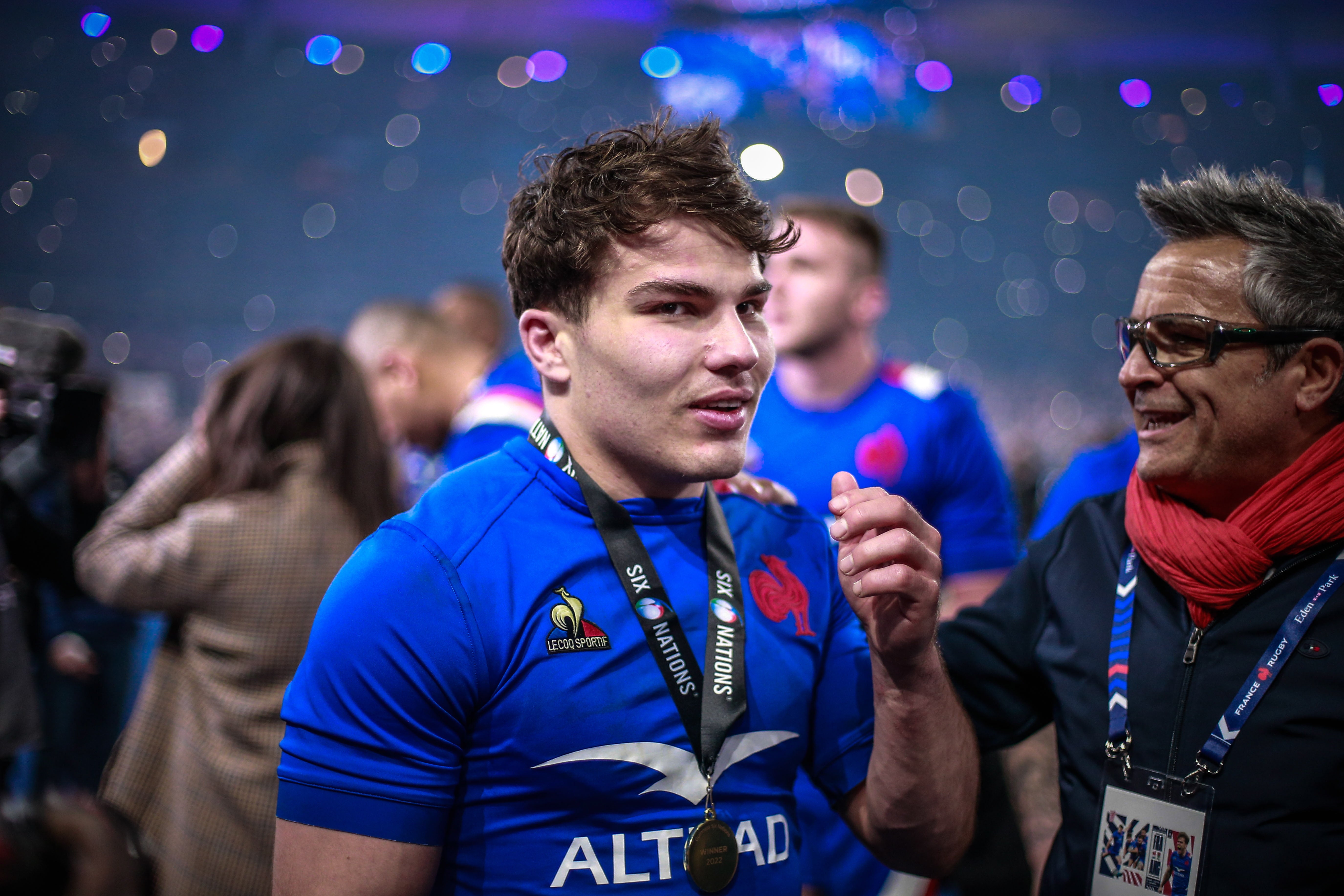 France's Antoine Dupont reacts during the trophy ceremony