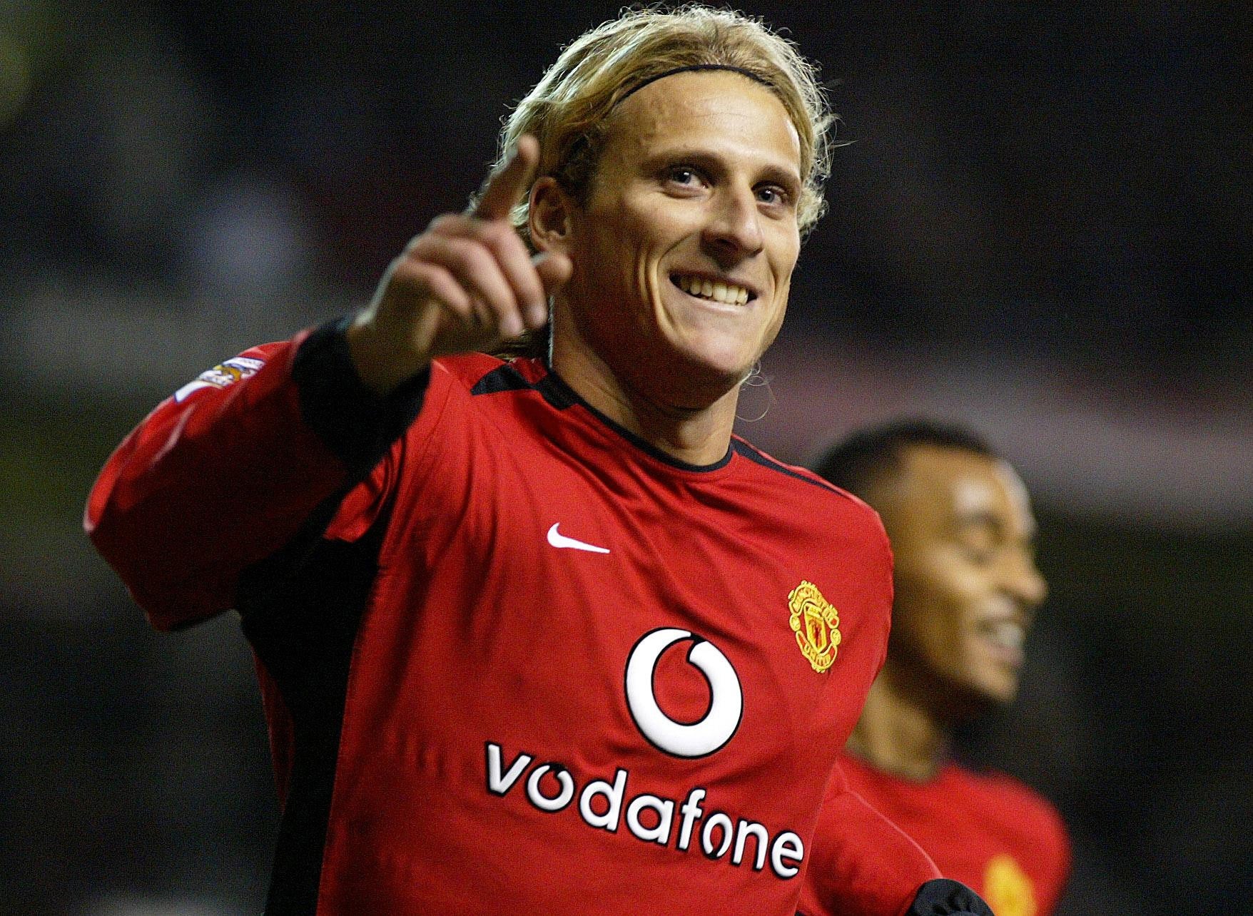 Diego Forlan keeps an eye on former club Manchester United (Martin Rickett/PA)