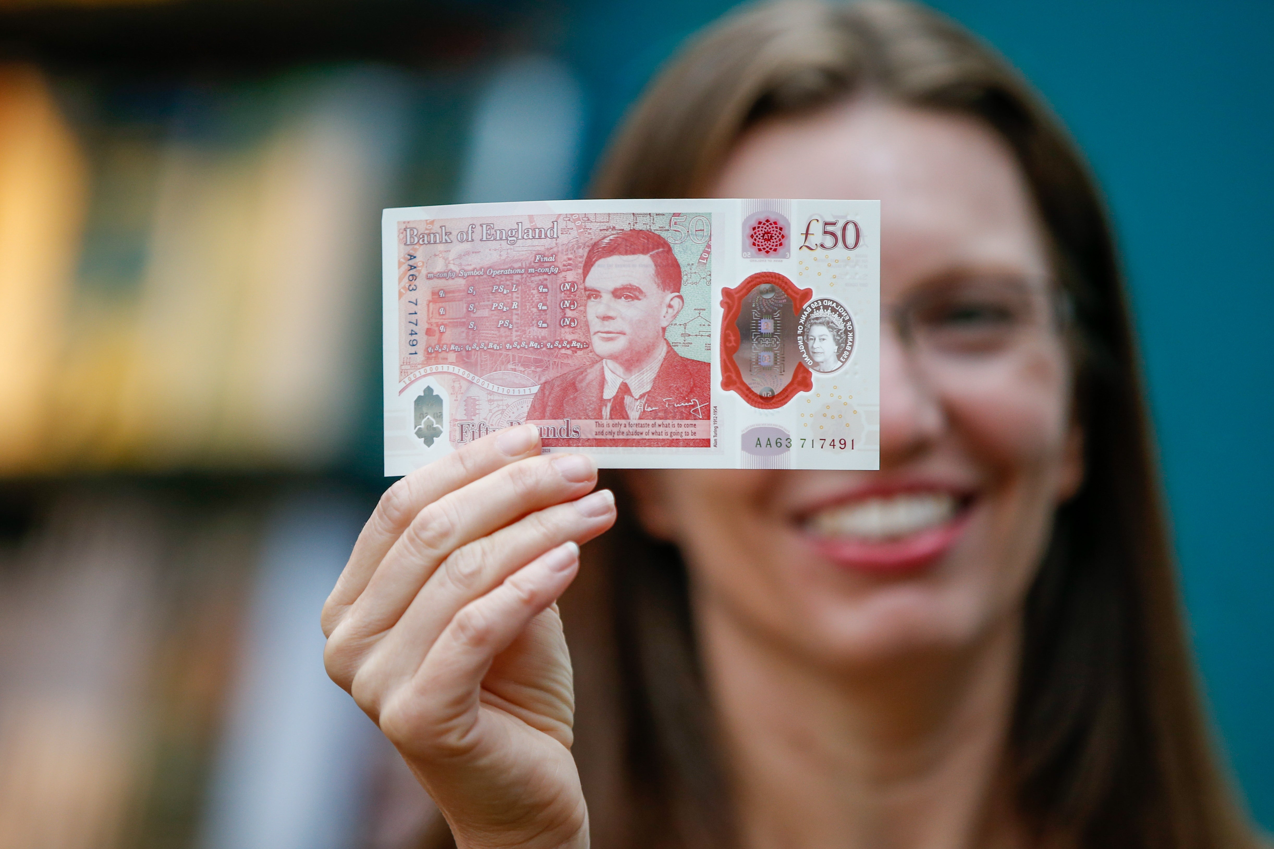 Sarah John, chief cashier of the Bank of England, with a new £50 banknote