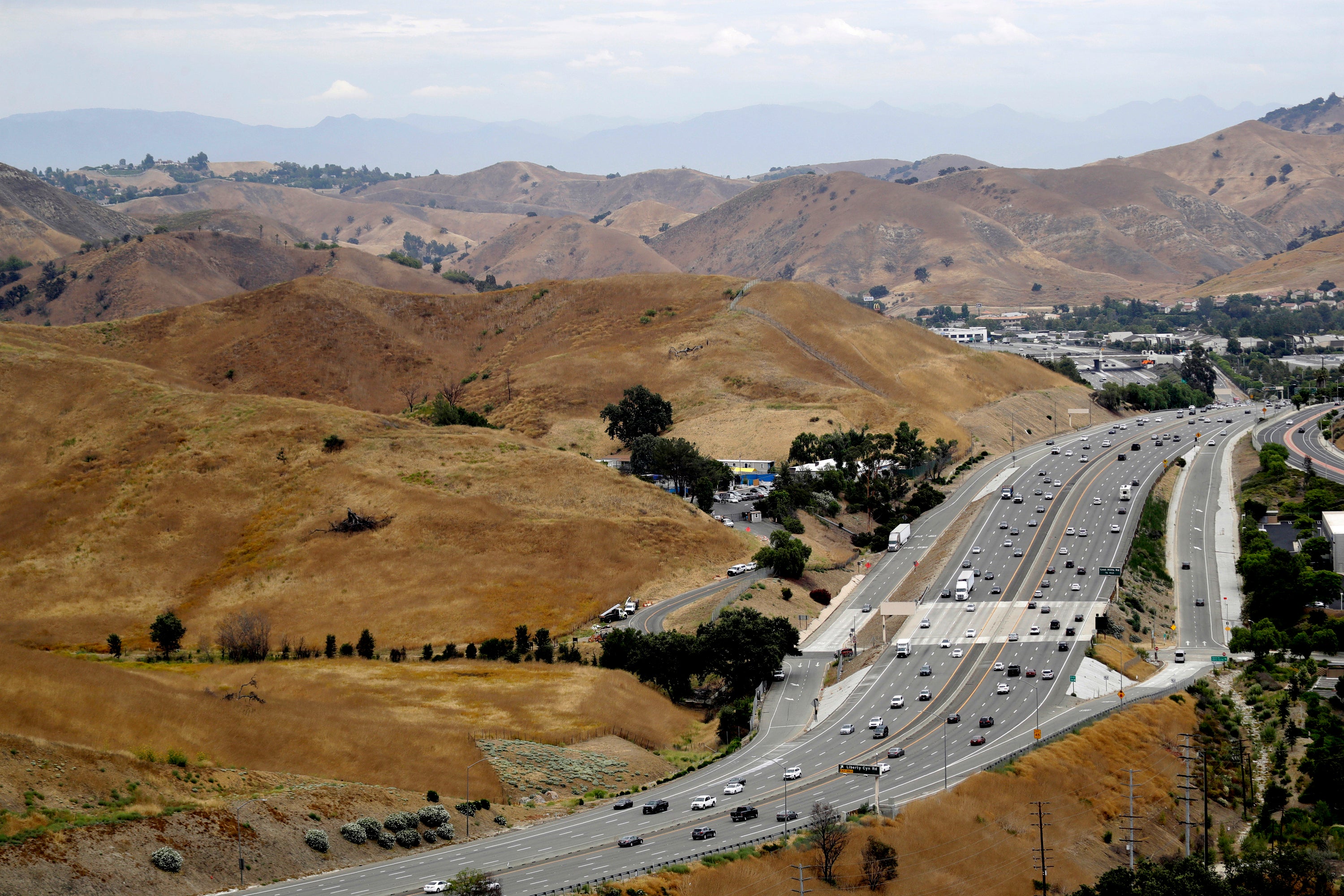 The bridge over the major Southern California highway will provide more room to roam for mountain lions and other animals hemmed in by urban sprawl