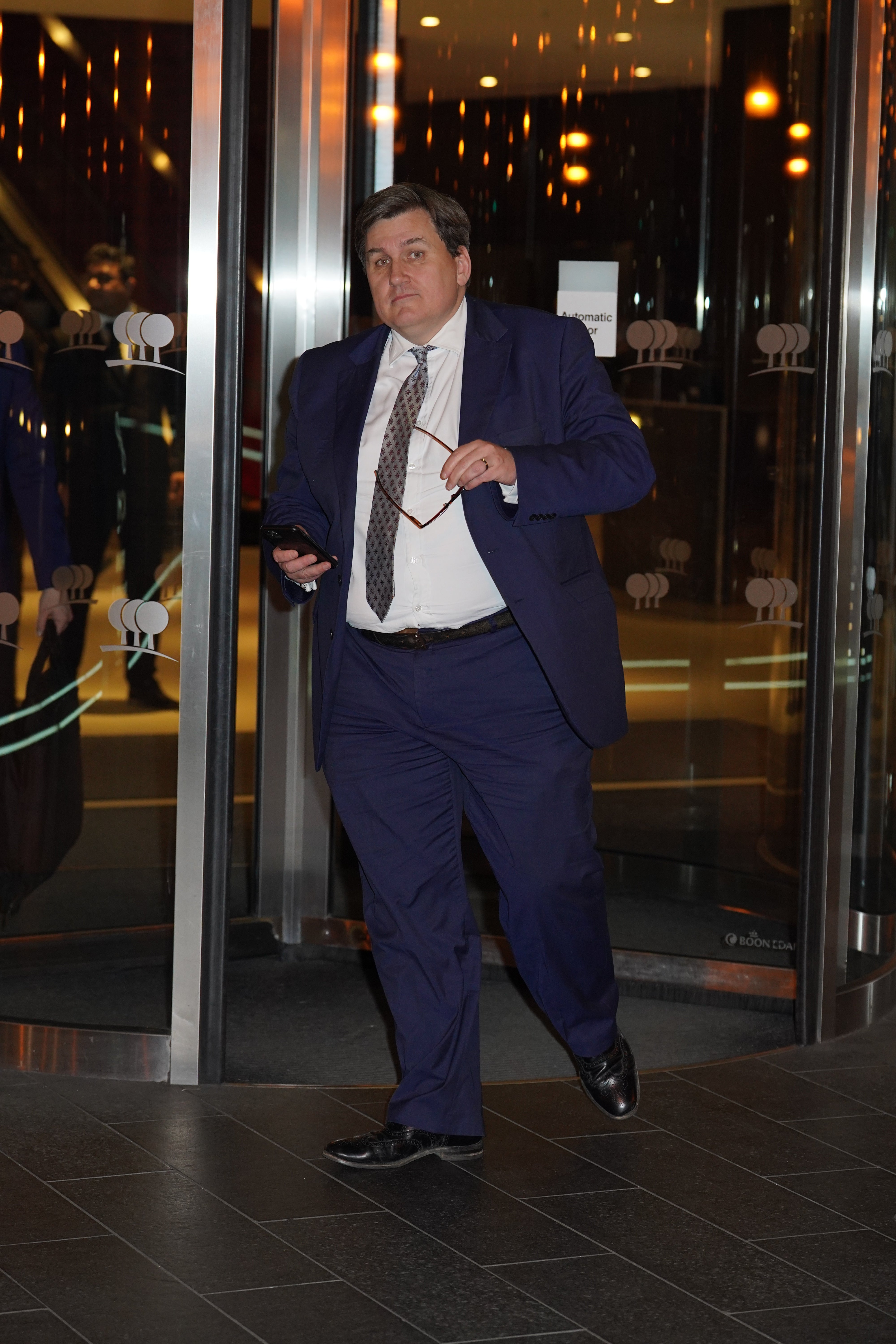 Home Office minister Kit Malthouse leaves the Park Plaza Hotel (Yui Mok/PA)