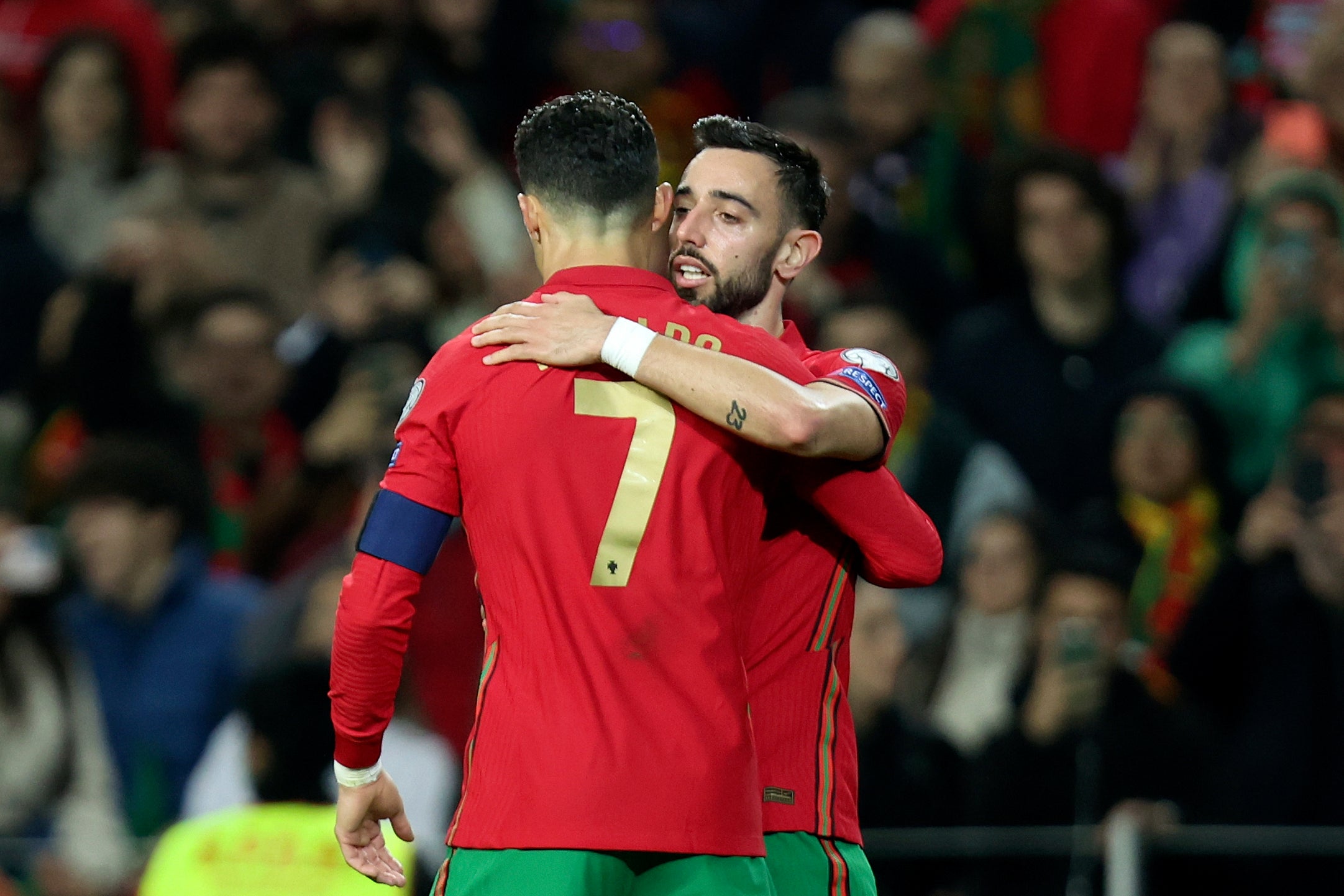 Bruno Fernandes and Cristiano Ronaldo celebrated Portugal’s qualification (Luis Vieira/AP)