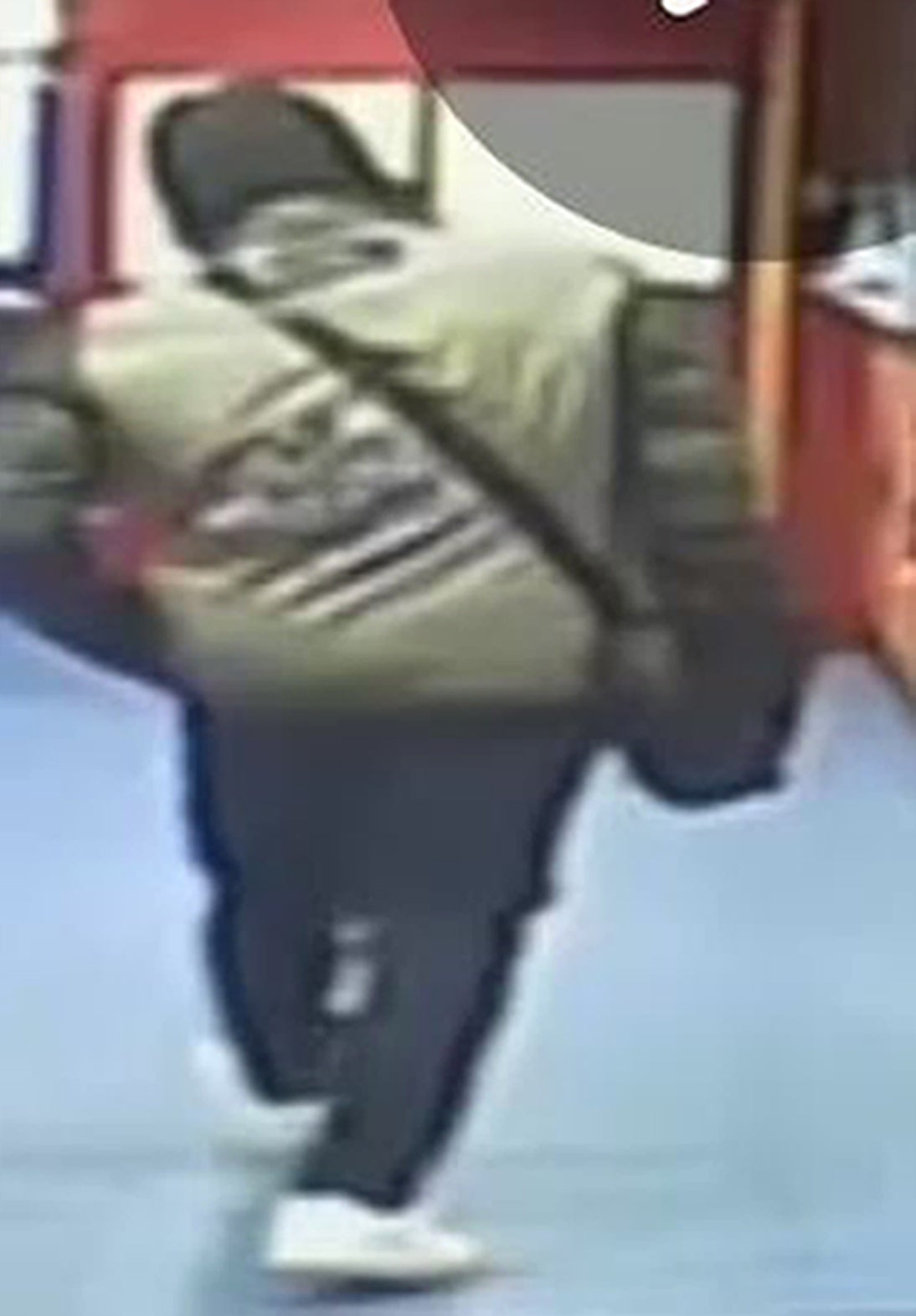 Police are appealing for help in tracing a man who threw a noxious substance at three shop workers in Lewisham on December 17 2021 (Met Police/ PA)